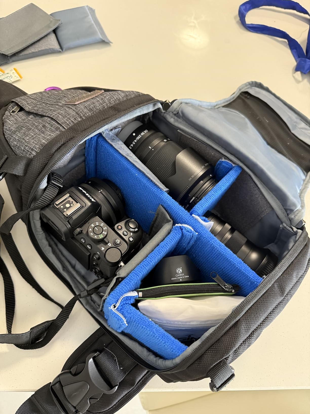 MOSISO Camera Sling Bag, DSLR/SLR/Mirrorless Camera Case Shockproof Photography Camera Backpack with Tripod Holder & Removable Modular Inserts Compatible with Canon/Nikon/Sony/Fuji, Black customer photo 2