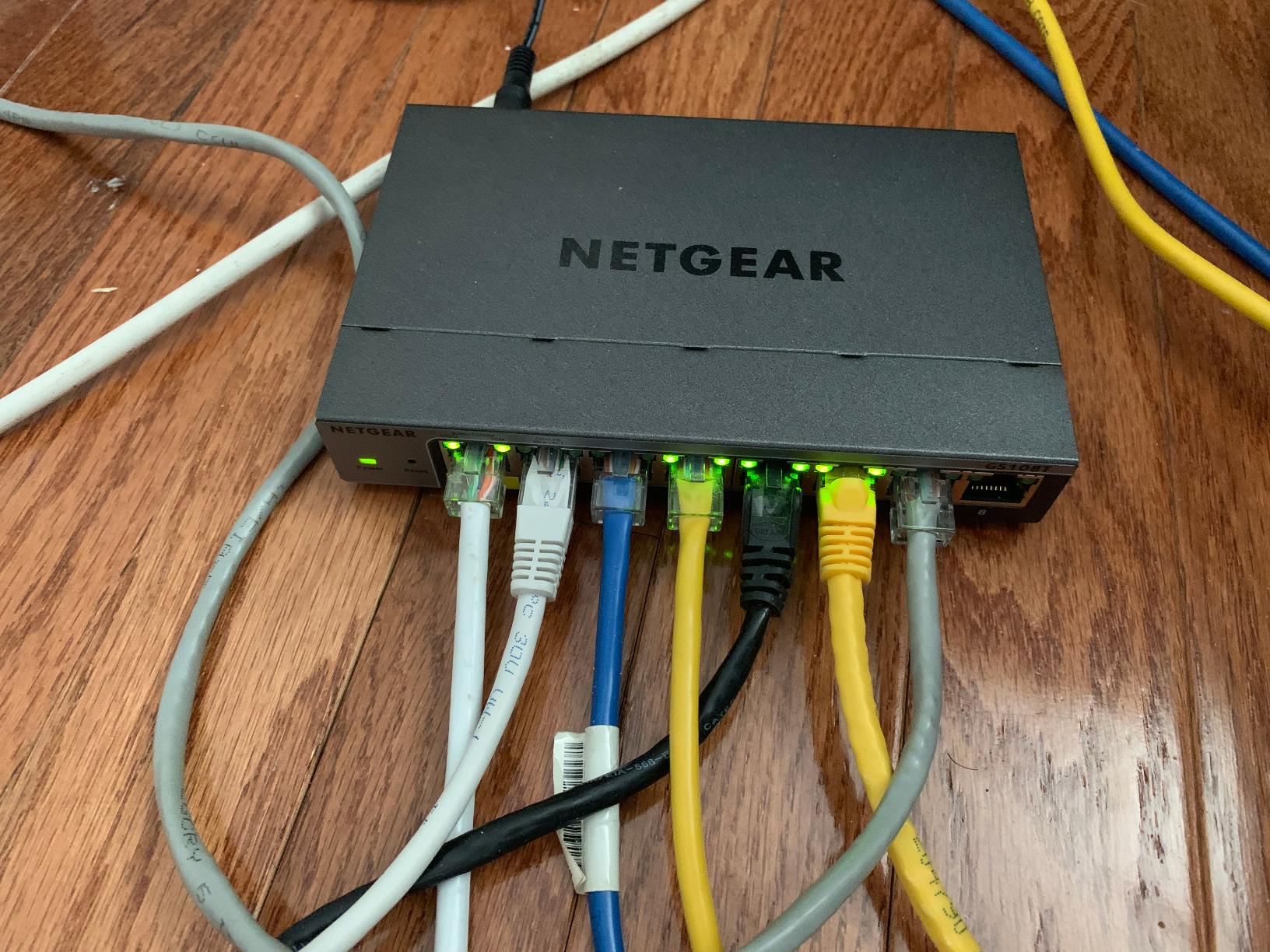 NETGEAR 8-Port Gigabit Ethernet Smart Switch (GS108T) - Managed, with 1 x PD , Optional Insight Cloud Management, Desktop or Wall Mount, Silent Operation, and Limited Lifetime Protection customer photo 2