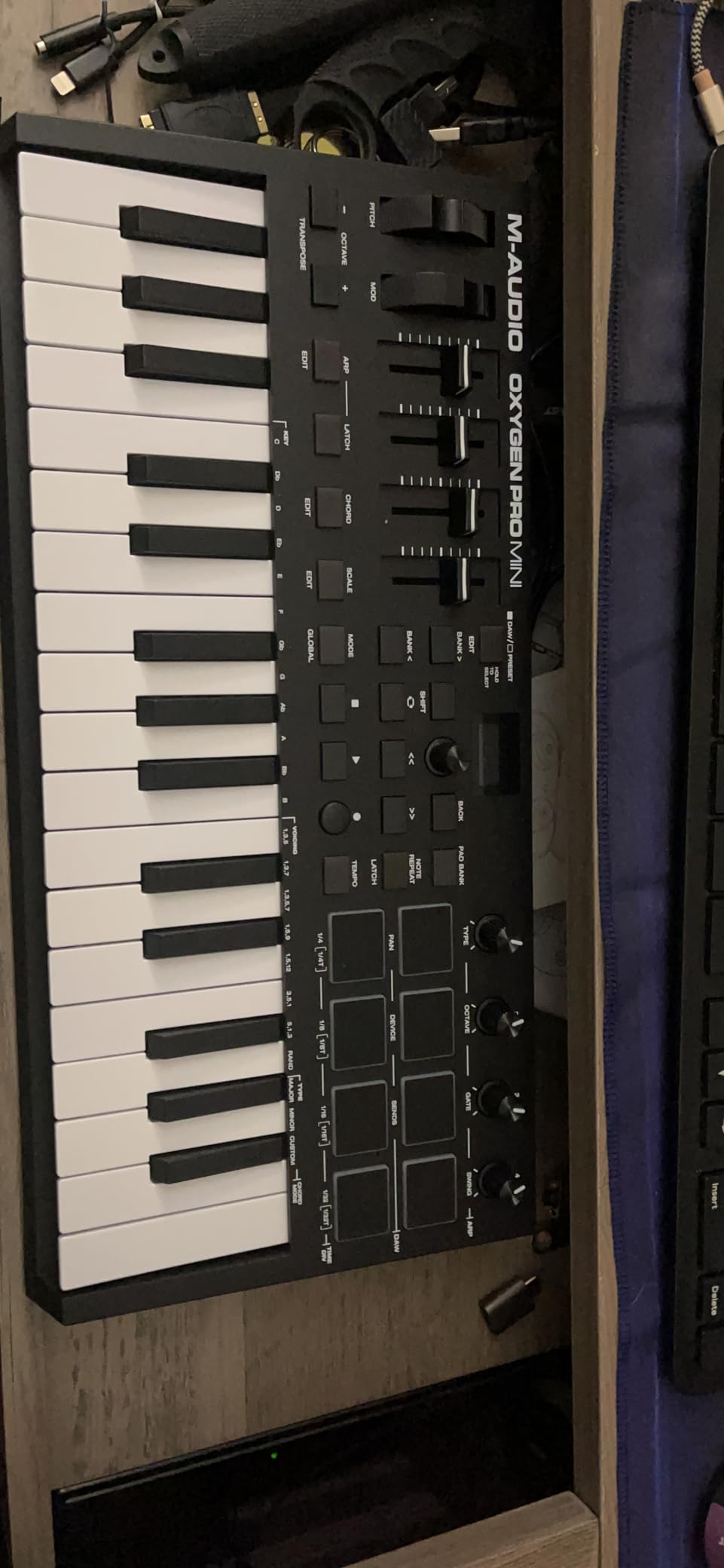 M-Audio Oxygen Pro Mini 32-Key USB MIDI Keyboard Controller for MacOS and WinOS, with Beat Pads, Assignable Knobs and Faders, and Native Instruments Sound Pack (NKS Integration) customer photo 1