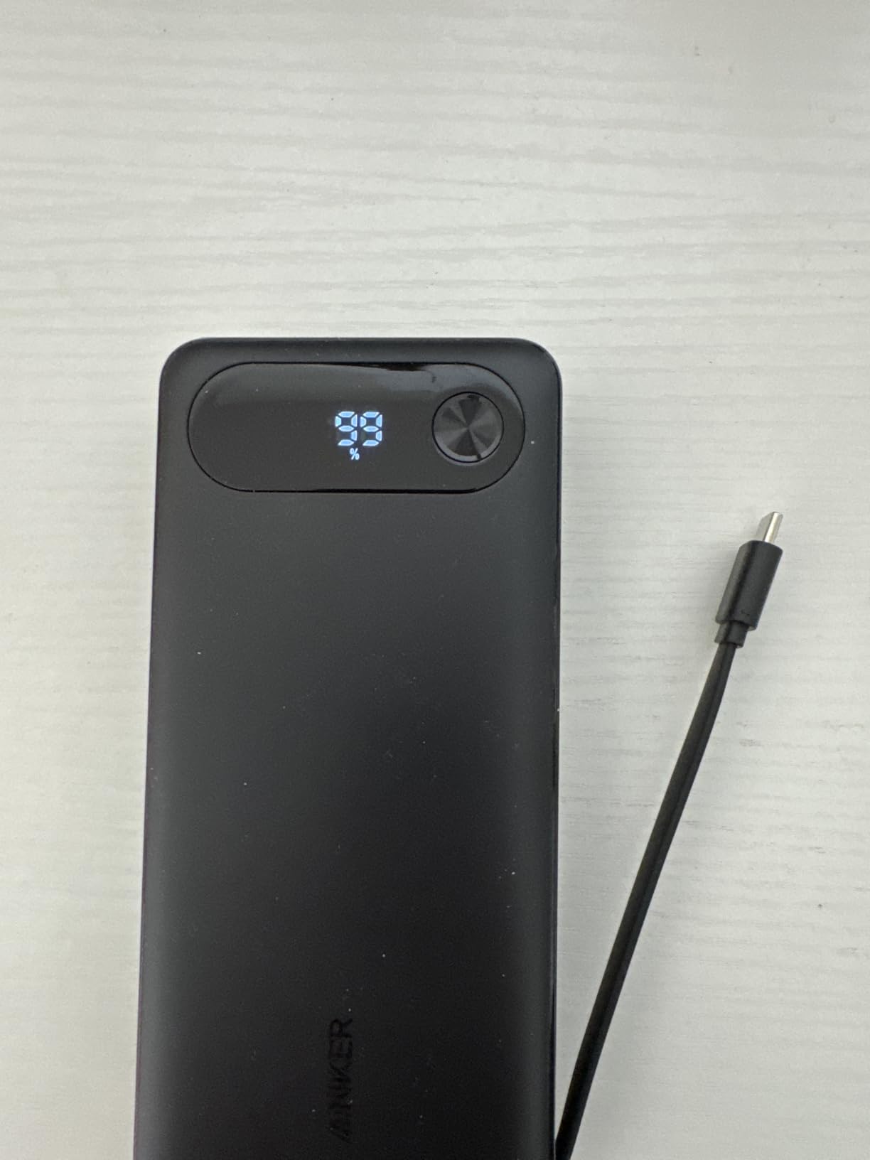 Anker Power Bank, 20,000mAh Travel Essential Portable Charger with Built-in USB-C Cable, 3-Port 87W Max Fast Charging Battery Pack customer photo 1