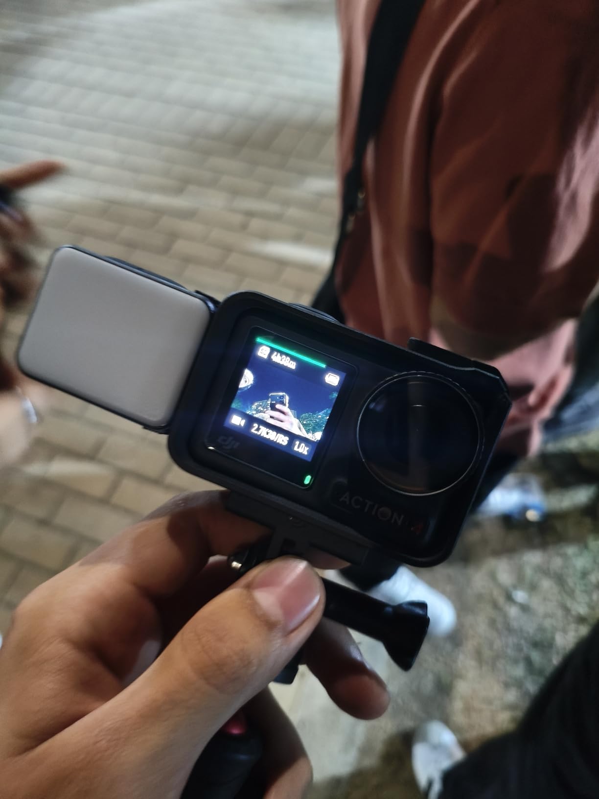 DJI Osmo Action 4 Essential Combo, 4K/120fps Waterproof Action Camera with a 1/1.3-Inch Sensor, Stunning Low-Light Imaging, 10-bit & D-Log M Color Performance, Long-Lasting 160 Mins, Outdoor Camera customer photo 2