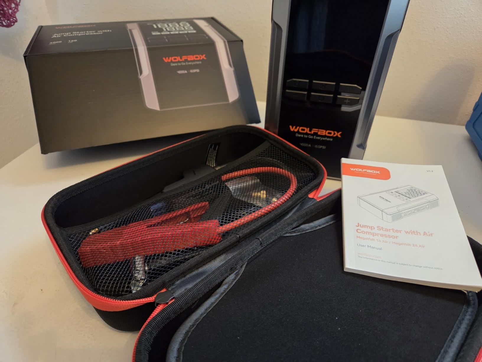 WOLFBOX 4000A Jump Starter with 160PSI Air Compressor, 12V Car Battery Booster, 88.8Wh Portable Jump Box (10.0 Gas/10.0L Diesel) with 65W Fast Charge, Tire Inflator, Jumper Cables, and LED Light customer photo 2