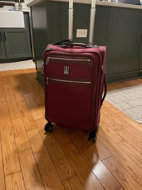 Travelpro Platinum Elite Softside Expandable Checked Luggage, 8 Wheel Spinner Suitcase, TSA Lock, Men and Women, True Navy Blue, Checked Medium 25-Inch customer photo 2