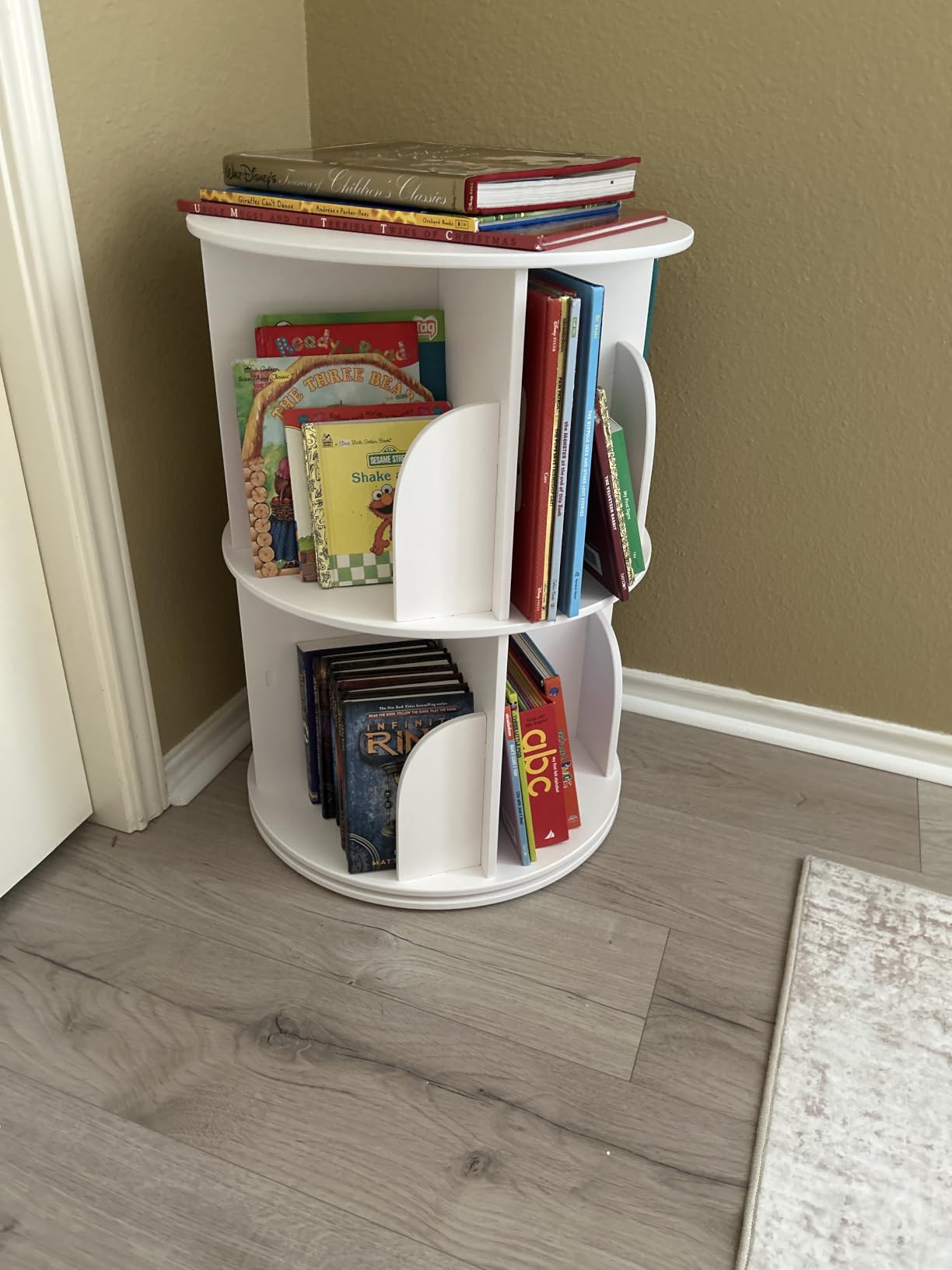 SpaceAid 4 Tier Rotating Bookshelf Tower, Spinning Bookcase Lazy Susan, Revolving 360 Book Shelf Storage Round Carousel, Vertical Rotate Turning Spiral Corner Organizer, White customer photo 2