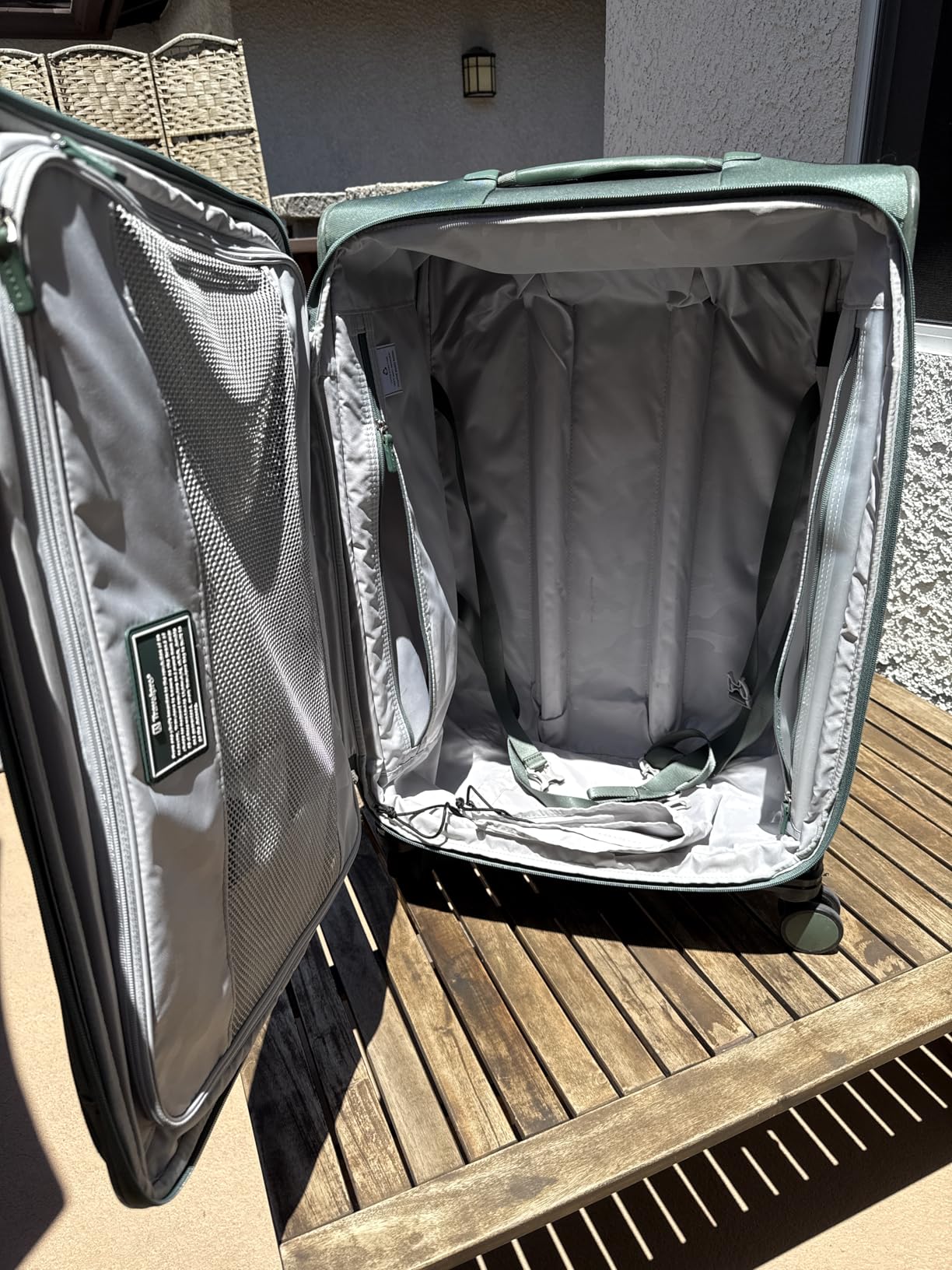 Travelpro VersaPack+ Lightweight Softside Expandable Carry on Luggage, 8 Spinner, TSA Lock, Carry On 21-Inch, Desert Sage Green customer photo 1