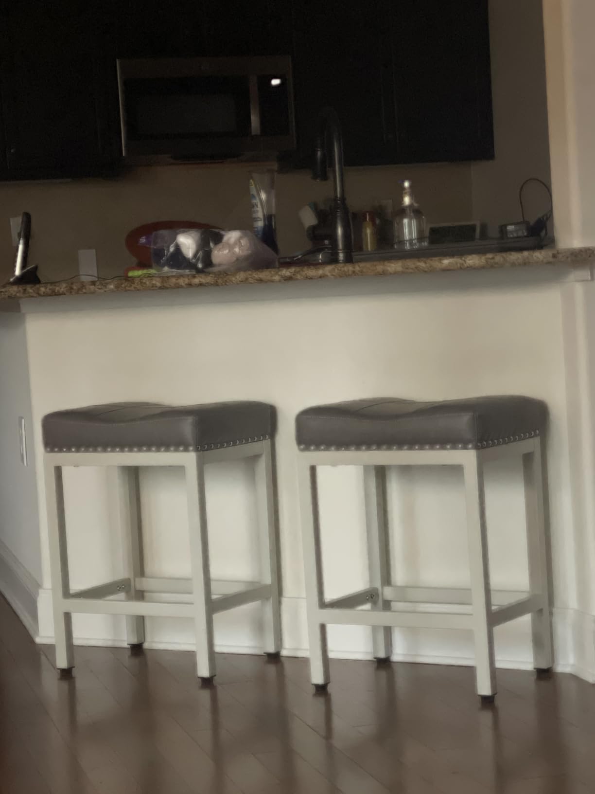 Sweetcrispy 24 Inch Bar Stools Set of 2, PU Leather Counter Height Stools | Upholstered Modern Saddle Barstools with Metal Base and Footrest for Home Bar, Small Apartment, Brown customer photo 1