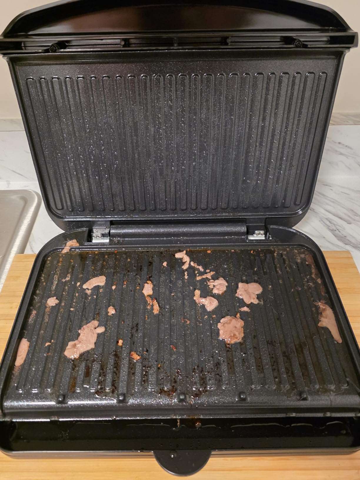 George Foreman Family-Size Grill & Panini Press, Nonstick Ceramic Coating, Fat-Removing Slope, Adjustable Angle, Indoor/Outdoor Use customer photo 1