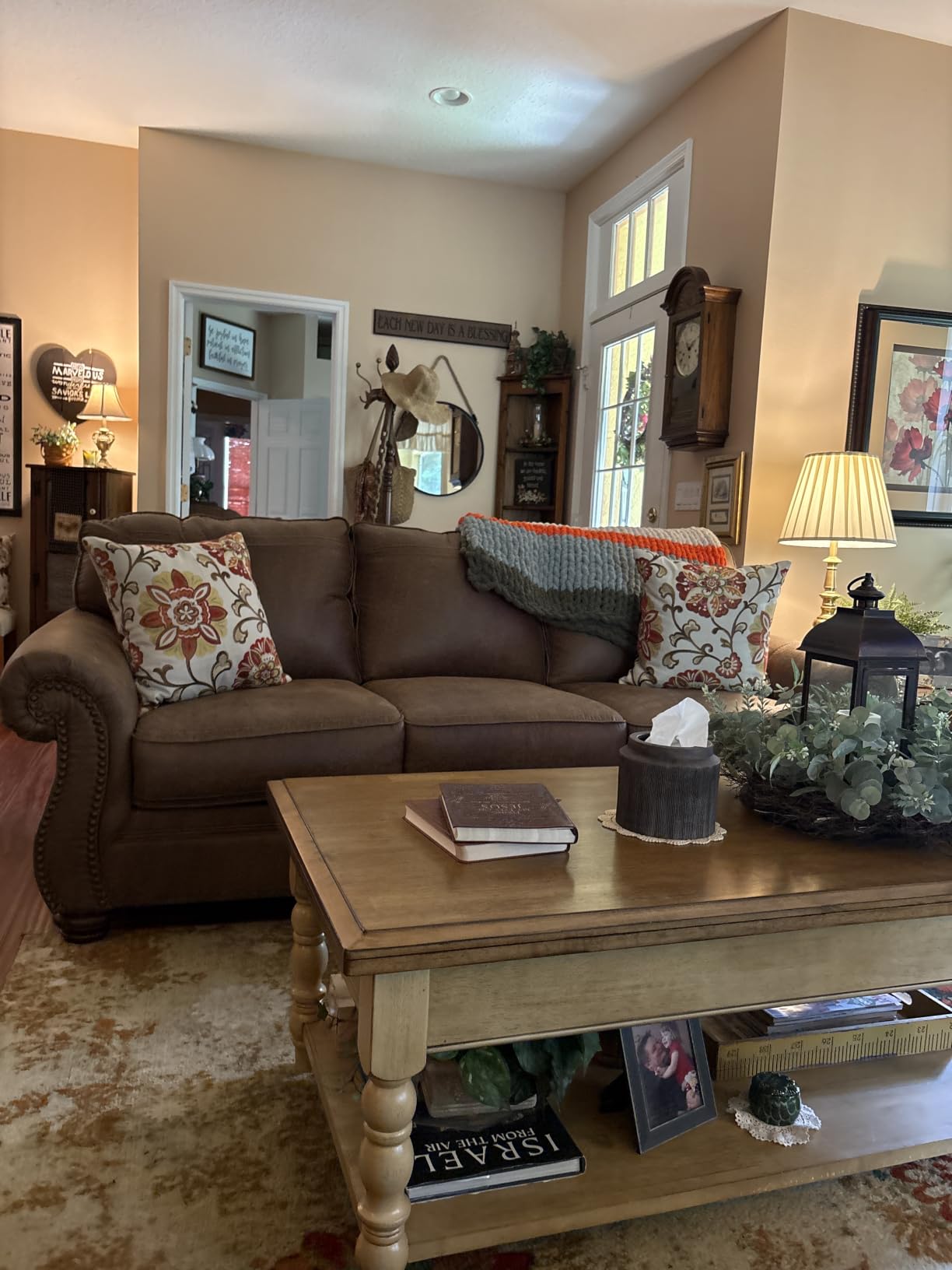 Signature Design by Ashley Faux Leather Sofa, Earth Brown, Chatterton | Nailhead trim accents, Decorative turned legs, Sag-resistant platform foundation customer photo 1