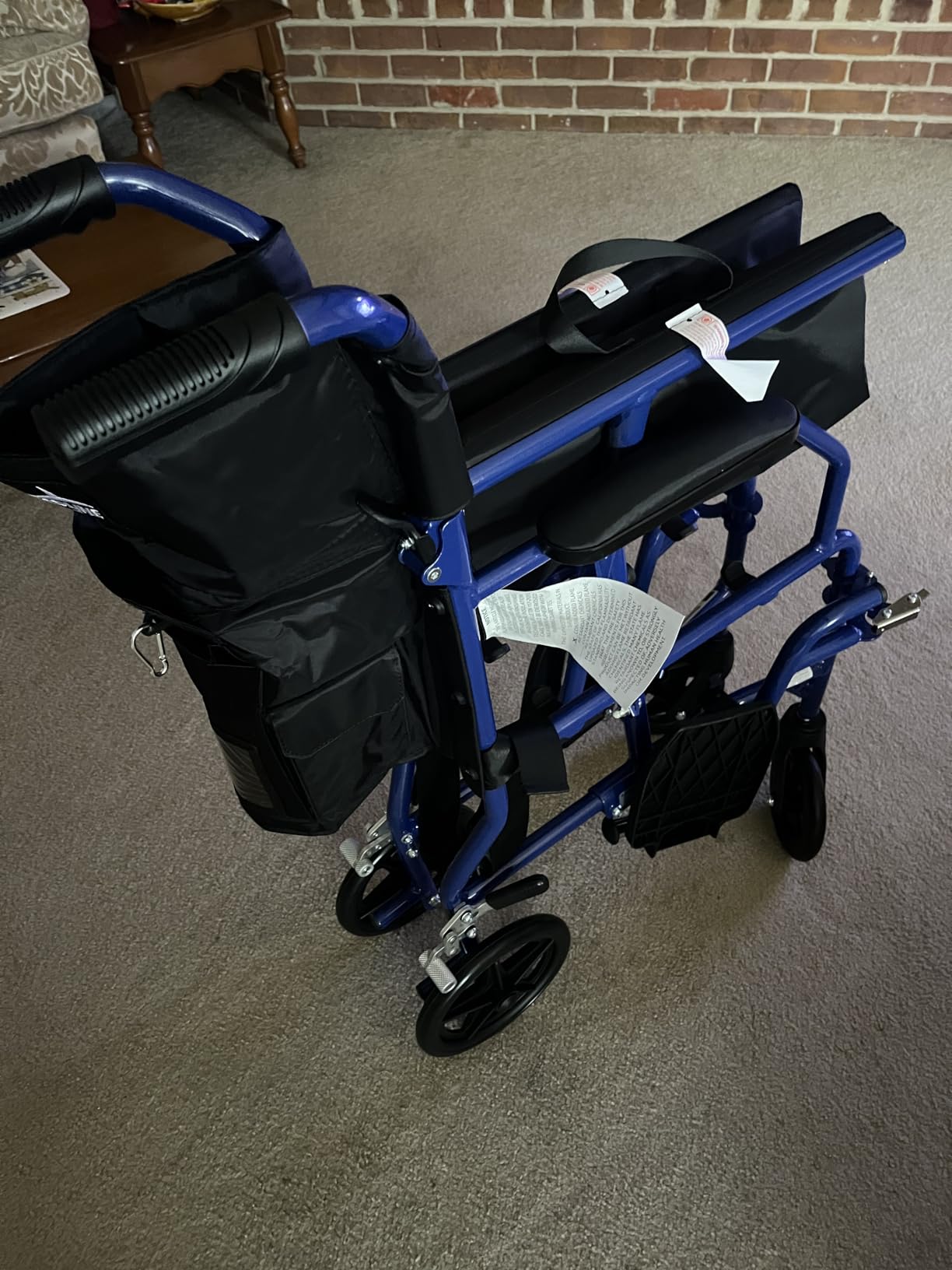 Medline Ultra Lightweight Transport Wheelchair for Adults, Foldable, 19-Inch Seat Width, Red Frame, Black Upholstery customer photo 1