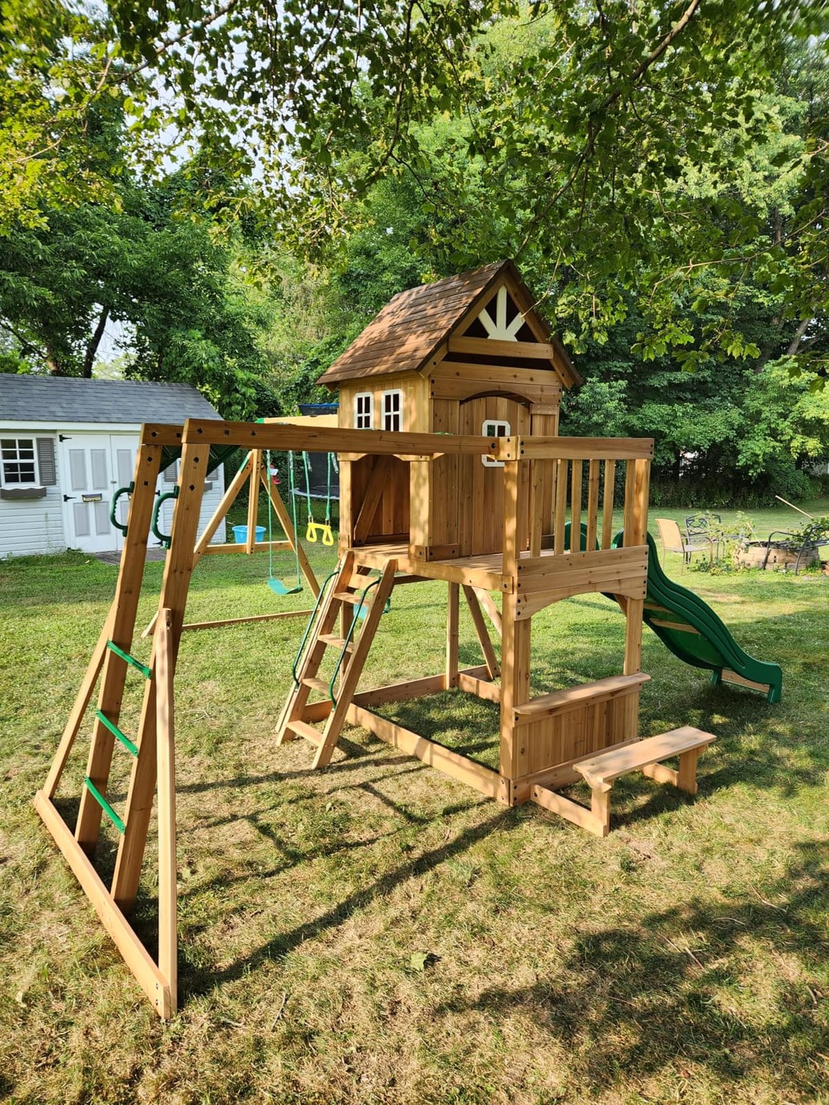 Backyard Discovery Montpelier Cedar Wood Swing Set, Wave Slide, Clubhouse, Monkey Bars, Picnic Area, Snack Bar, Belt Swings, Trapeze, Balcony, Playhouse, Working Door, Ladder, Outdoor Playset customer photo 1