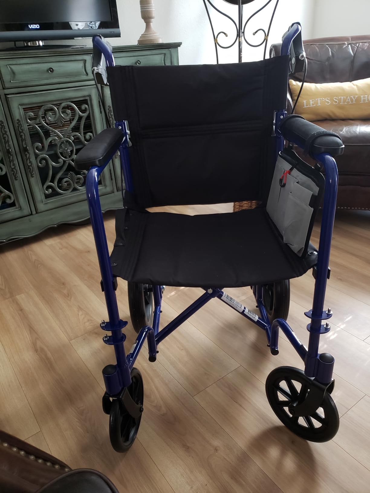 Medline Lightweight Foldable Transport Wheelchair with Handbrakes and 12-Inch Wheels, Red Frame, Black Upholstery customer photo 1