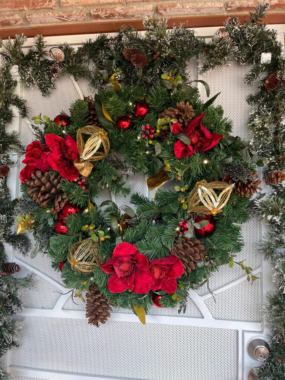 30 Inch Pre-Lit Artificial Christmas Wreath, Red Magnolia | Indoor/Outdoor, Pre Lit with 50 LED Lights, Remote Controlled Battery Powered Timer, Compatible with A/C Adapter customer photo 1