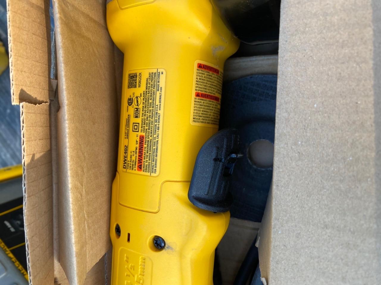 DEWALT Angle Grinder, 4-1/2 in., 11 Amp, 11,000 RPM, Dust Ejection System, Electric Grinder Tool with Abrasive Wheel Included (DWE402W) customer photo 1