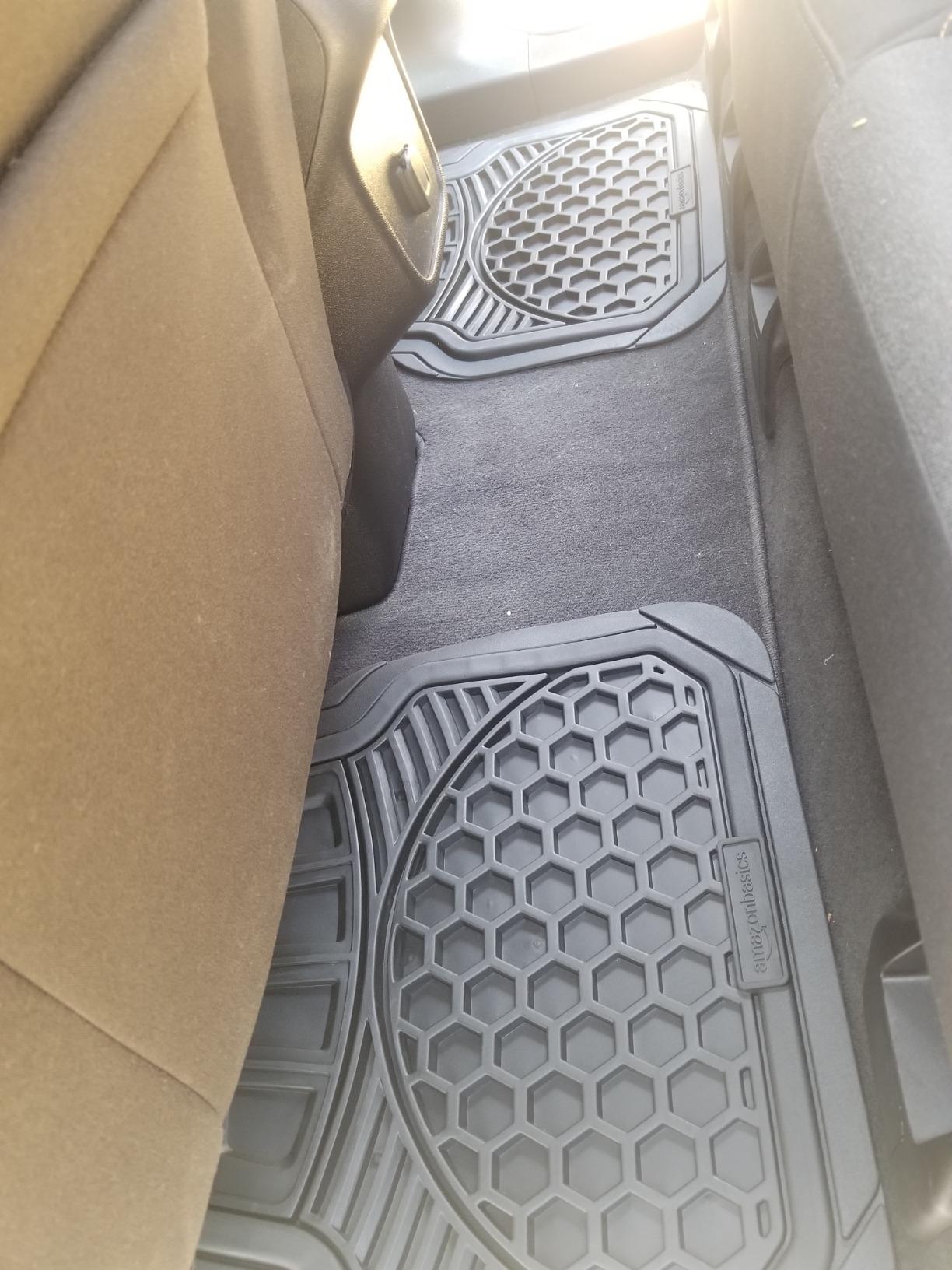 Amazon Basics Heavy Duty Thick PVC Car Floor Mats, Anti-Slip, Easy to Clean, Universal Trim-to-Fit All-Weather for Automotive SUV Sedans Trucks, 4-Piece, Solid Black customer photo 1