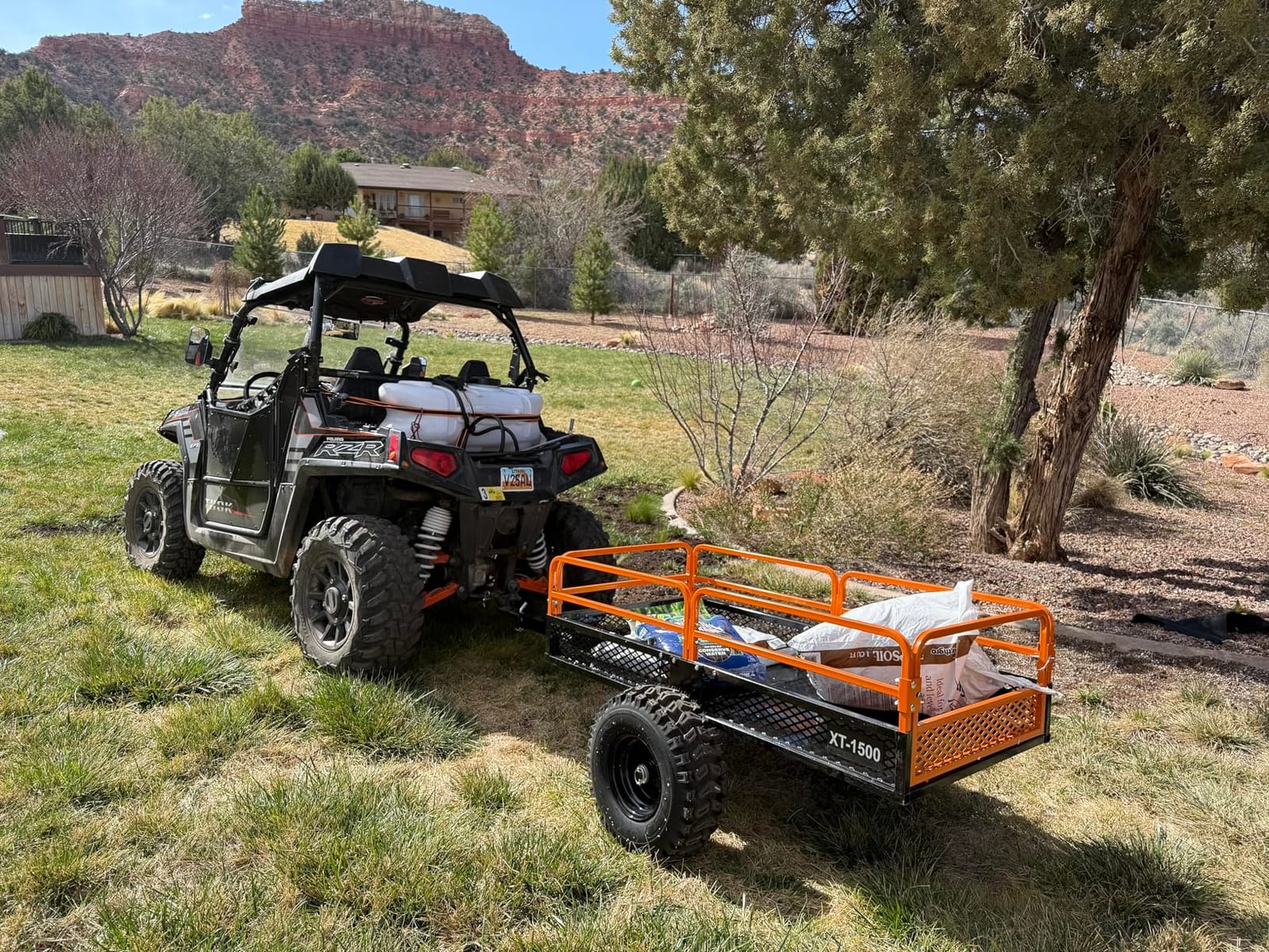 Impact IMPLEMENTS 1500lb ATV/UTV/Tractor Trailer with Solid Steel Floor, Aggressive Tires, & Pivoting Tongue. Great for Agricultural Use & Land Management. Designed in Trademarked in The USA! customer photo 1