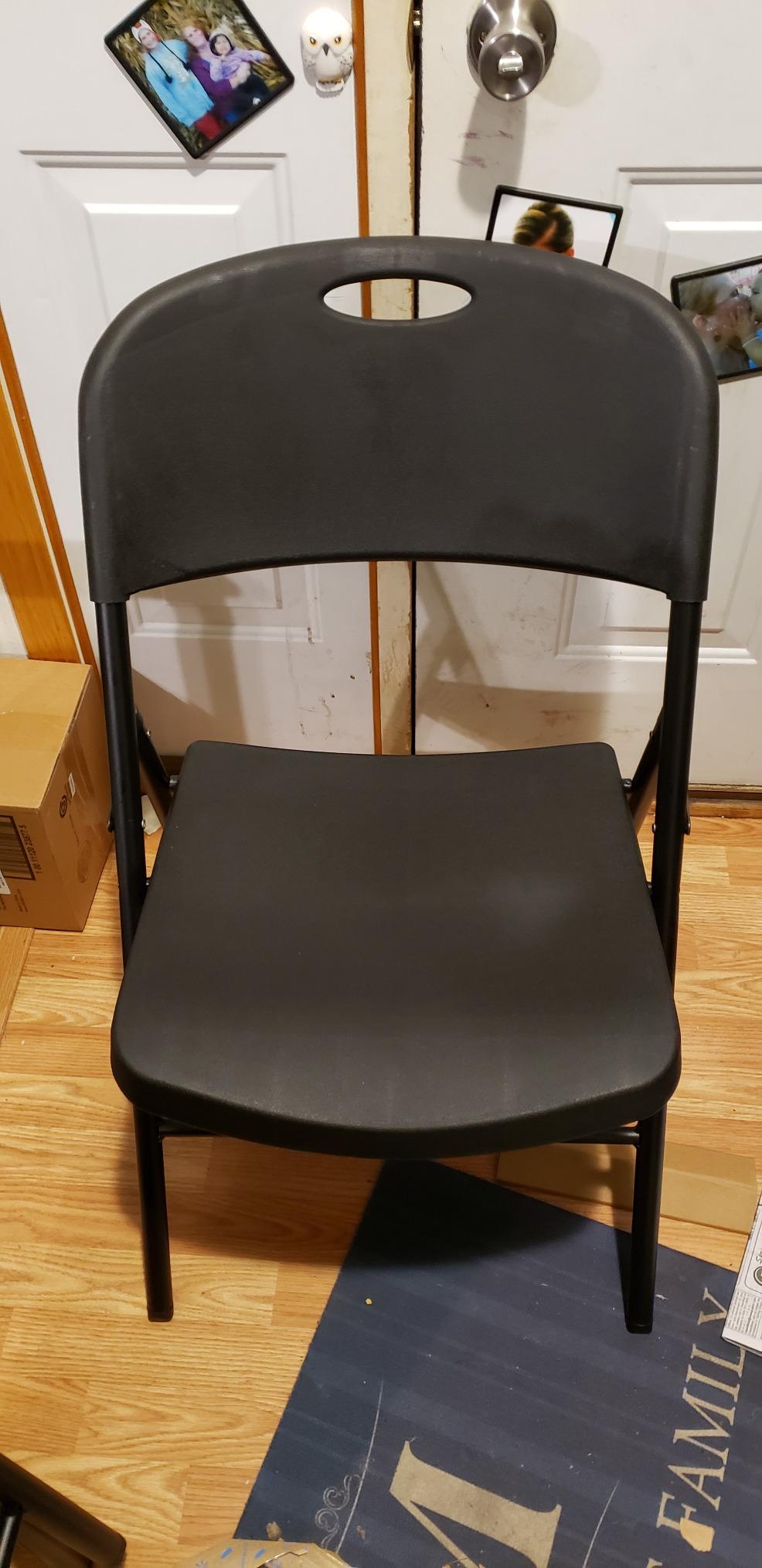 Amazon Basics Sturdy Foldable Portable Plastic Chair, 350-Pound Capacity, Supportive Seating for Events, Space-Saving, Black, 6-Pack customer photo 2