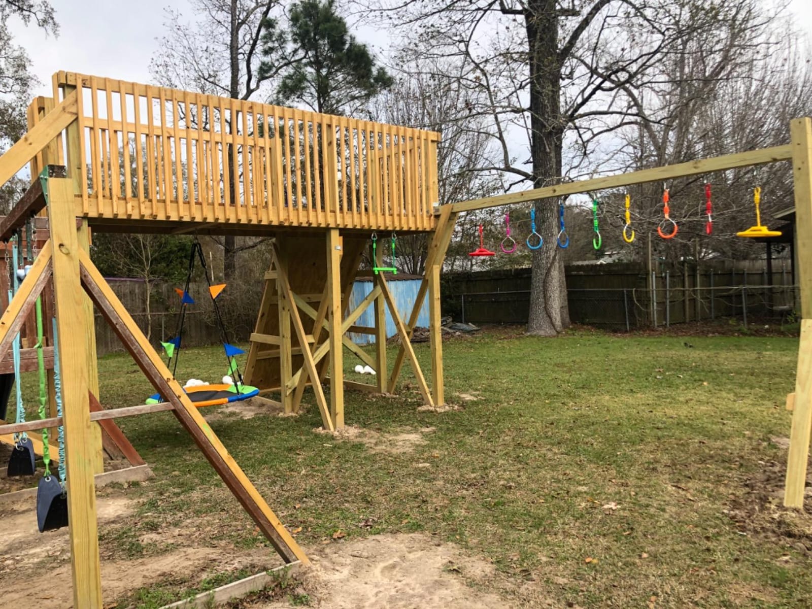 Ninja Rings, Trapeze Wheels & Monkey Bars, Obstacle Course | 7 Rings, 2 Trapeze Wheels, 2 Monkey Bars, Supports 260lbs, Ages 3+ customer photo 1