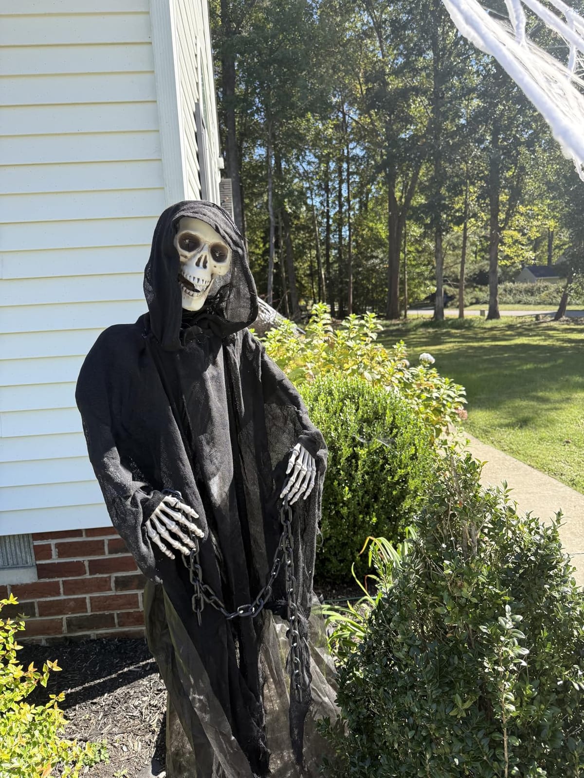 Haunted Hill Farm Life-Size 5.5-Ft Scary Grim Reaper with Chain, Halloween Animatronic with Touch Activated Lights and Sounds customer photo 2