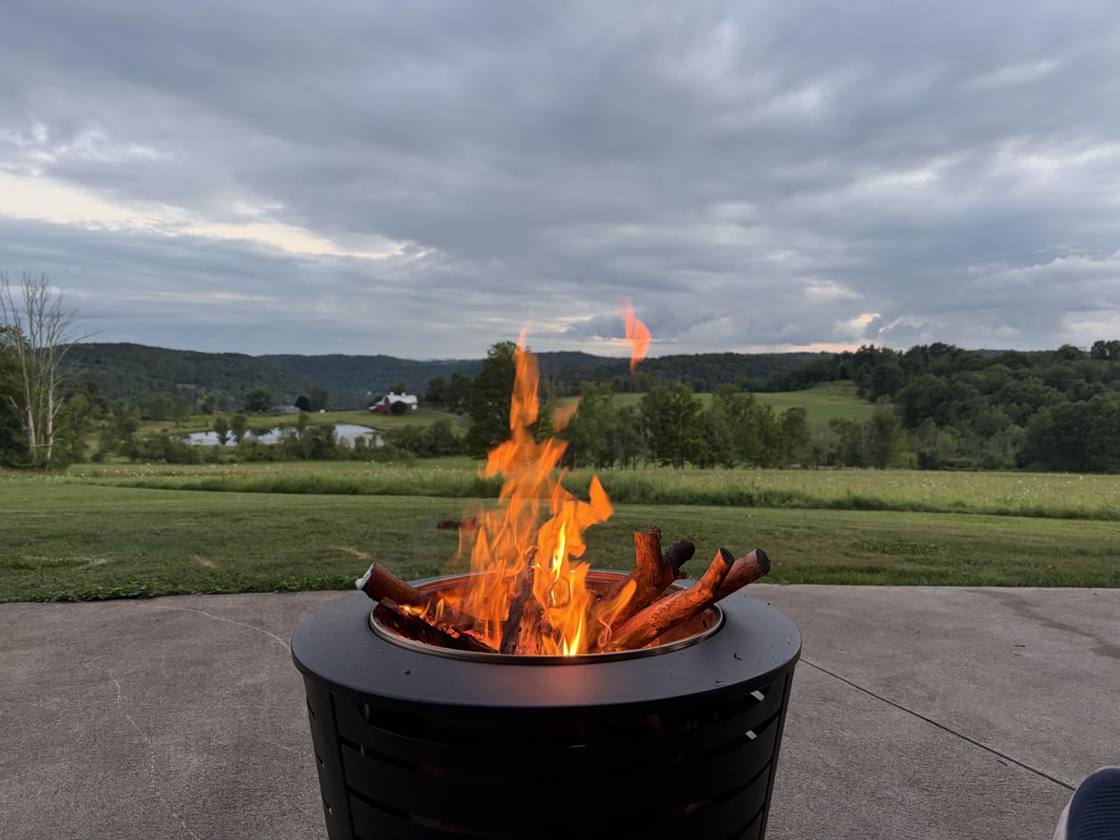 TIKI Patio Smokeless Fire Pit, 25 in Wood Burning Fire Pit with Cover | Black, 25-Inch, Stainless Steel, Wood-Burning, For Backyards and Patios, Includes Cover, Removable Ash Pan, Stand Included customer photo 1