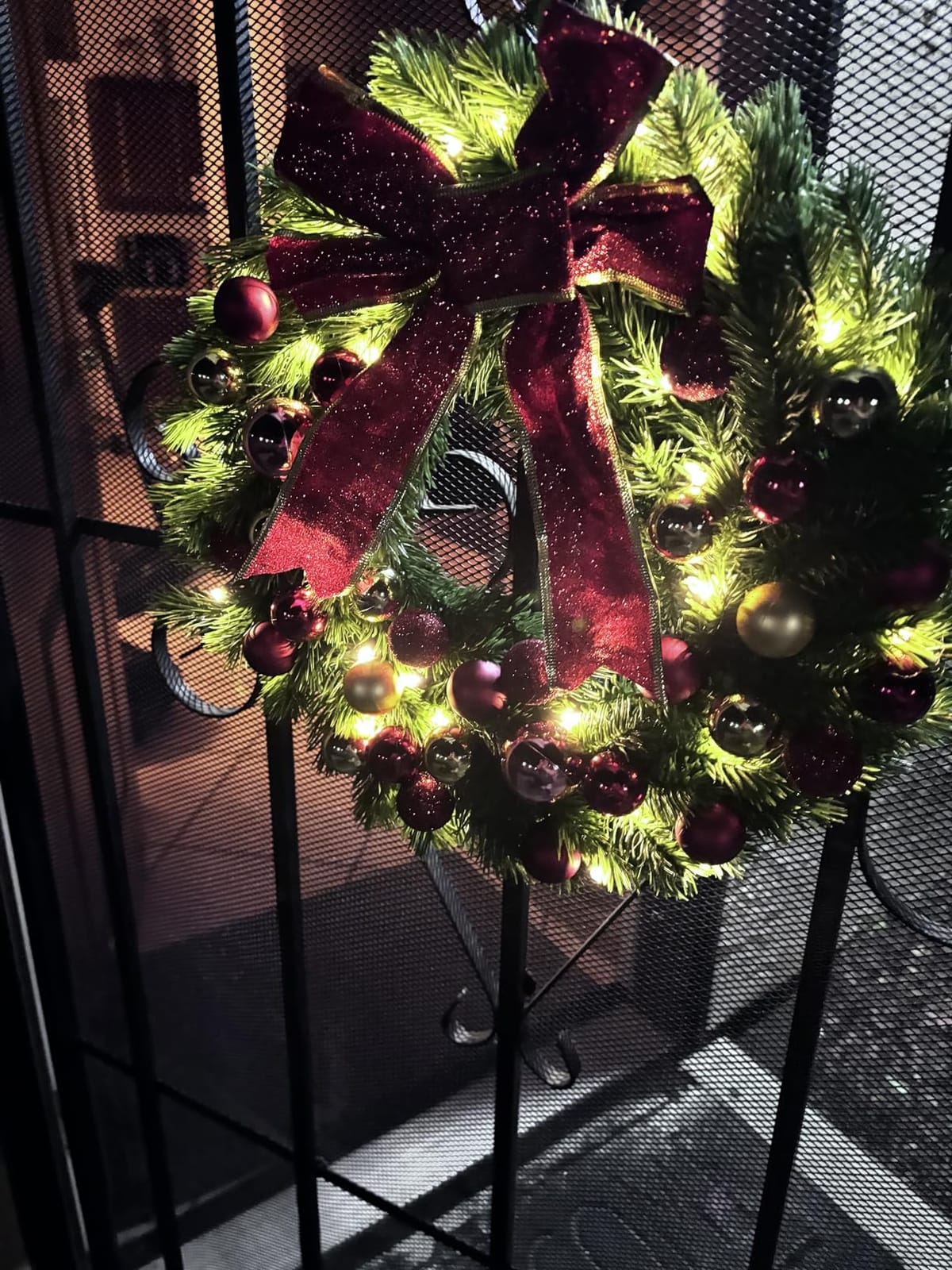 Juegoal 16 Inch Pre-Lit Christmas Wreath with Metal Hanger, Large Red Bow and Colored Balls, Battery Operated with Warm White 40 LEDs Lights, Front Door Spruce Lighted Wreath X-max Decorations customer photo 2
