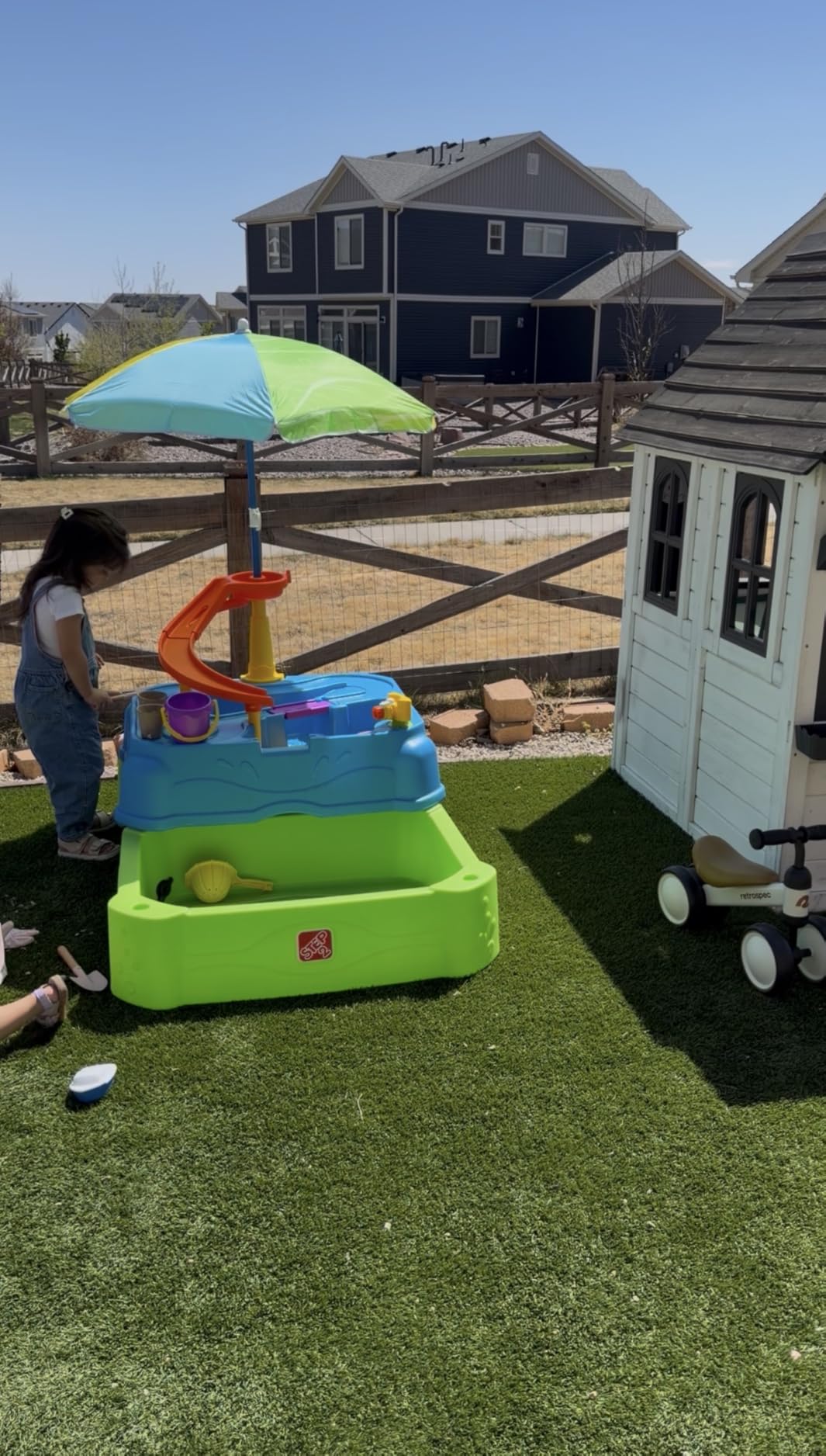 Step2 Waterpark Wonders Two Tier Water Table, Kids Water Activity Sensory Playset with Umbrella, Garden Hose Sprinkler Attachment, 11 Piece Accessories, Outdoor Summer Toy, Ages 18 Months+, Blue customer photo 1