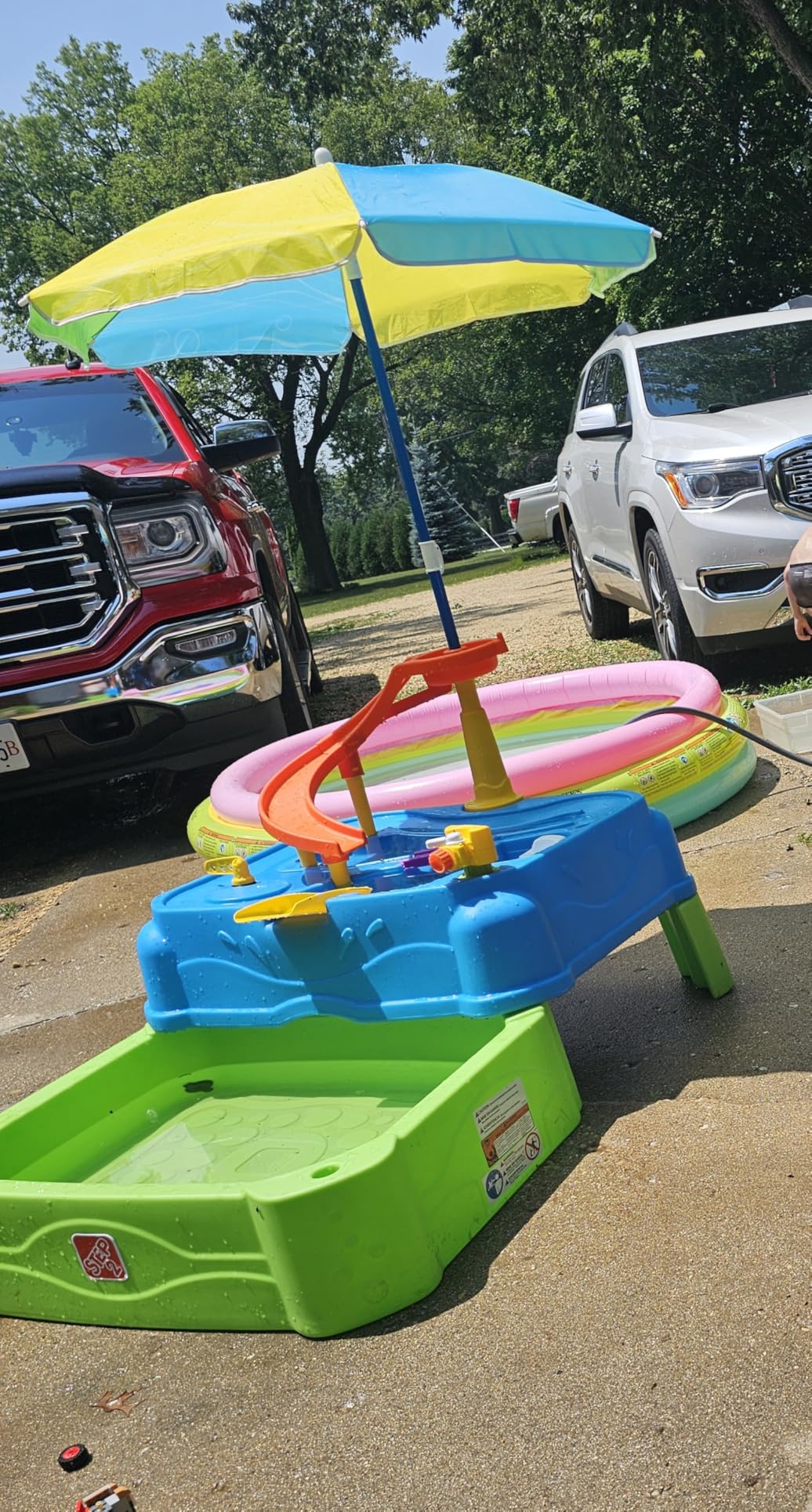 Step2 Waterpark Wonders Two Tier Water Table, Kids Water Activity Sensory Playset with Umbrella, Garden Hose Sprinkler Attachment, 11 Piece Accessories, Outdoor Summer Toy, Ages 18 Months+, Blue customer photo 2