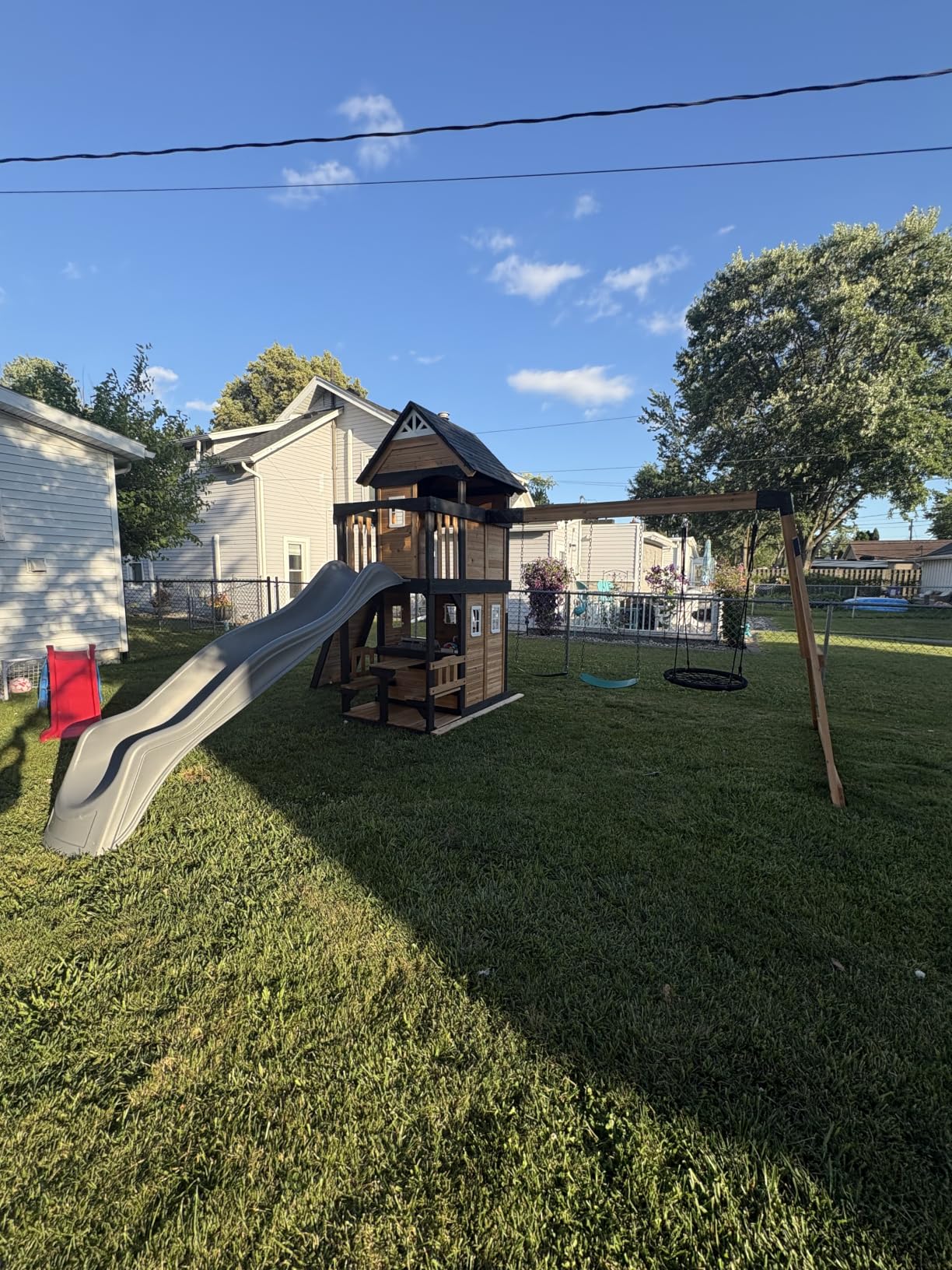 Backyard Discovery Canyon Creek Cedar Wood Swing Set with Wave Slide, Clubhouse, Play Kitchen, Picnic Area, Belt Swings, Web Swing, Rock Wall, Balconies, Playhouse, Step Ladder, Outdoor Playset customer photo 1