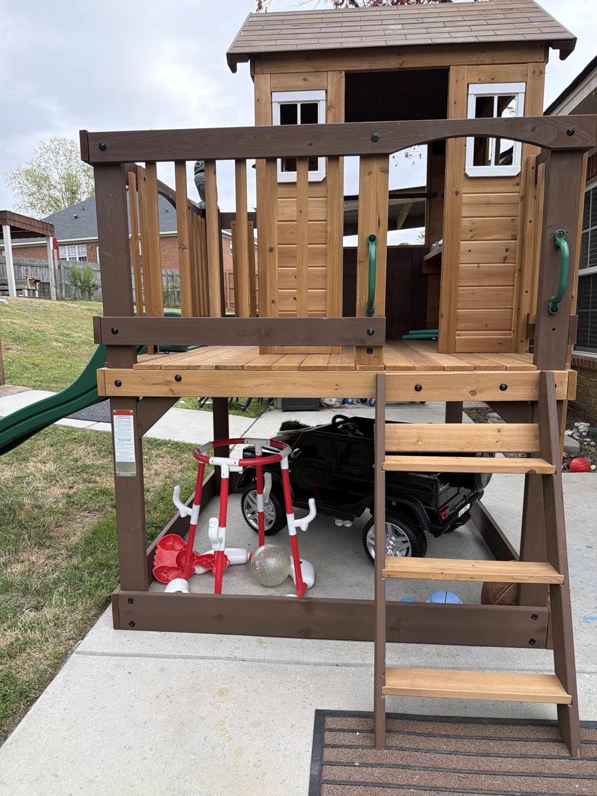 Backyard Discovery Echo Heights Elevated Cedar Wooden Kids Playhouse with Wave Slide, Play Kitchen, Wrap-Around Deck, Flat-Step Ladder, Half Door, Windows, Bell, and Growth Chart for Outdoor Play customer photo 1