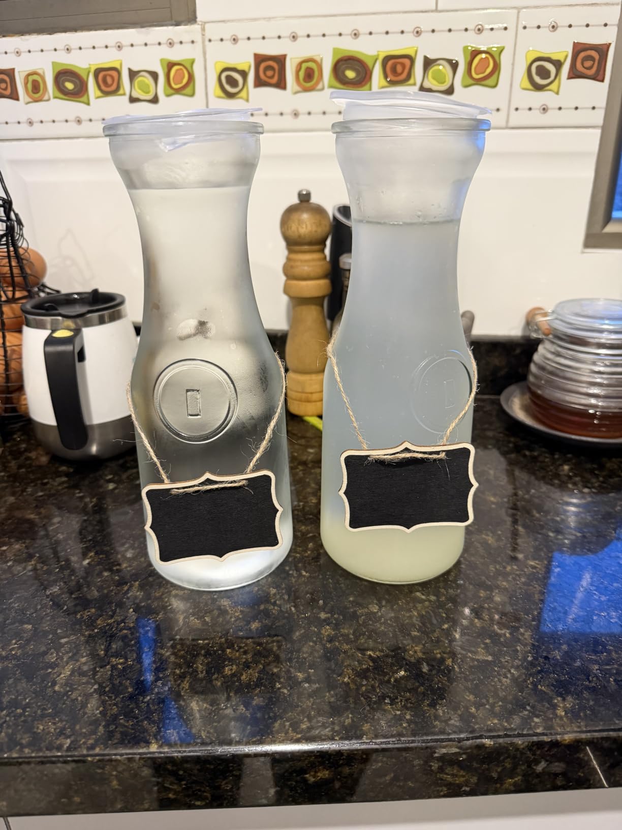 NETANY Set of 4 Glass Carafe with Lid, 1 Liter Beverage Serveware Carafe, Clear Glass Pitcher for Mimosa Bar, Brunch, Cold Water, Juice, Milk, Iced Tea, Lemonade customer photo 2