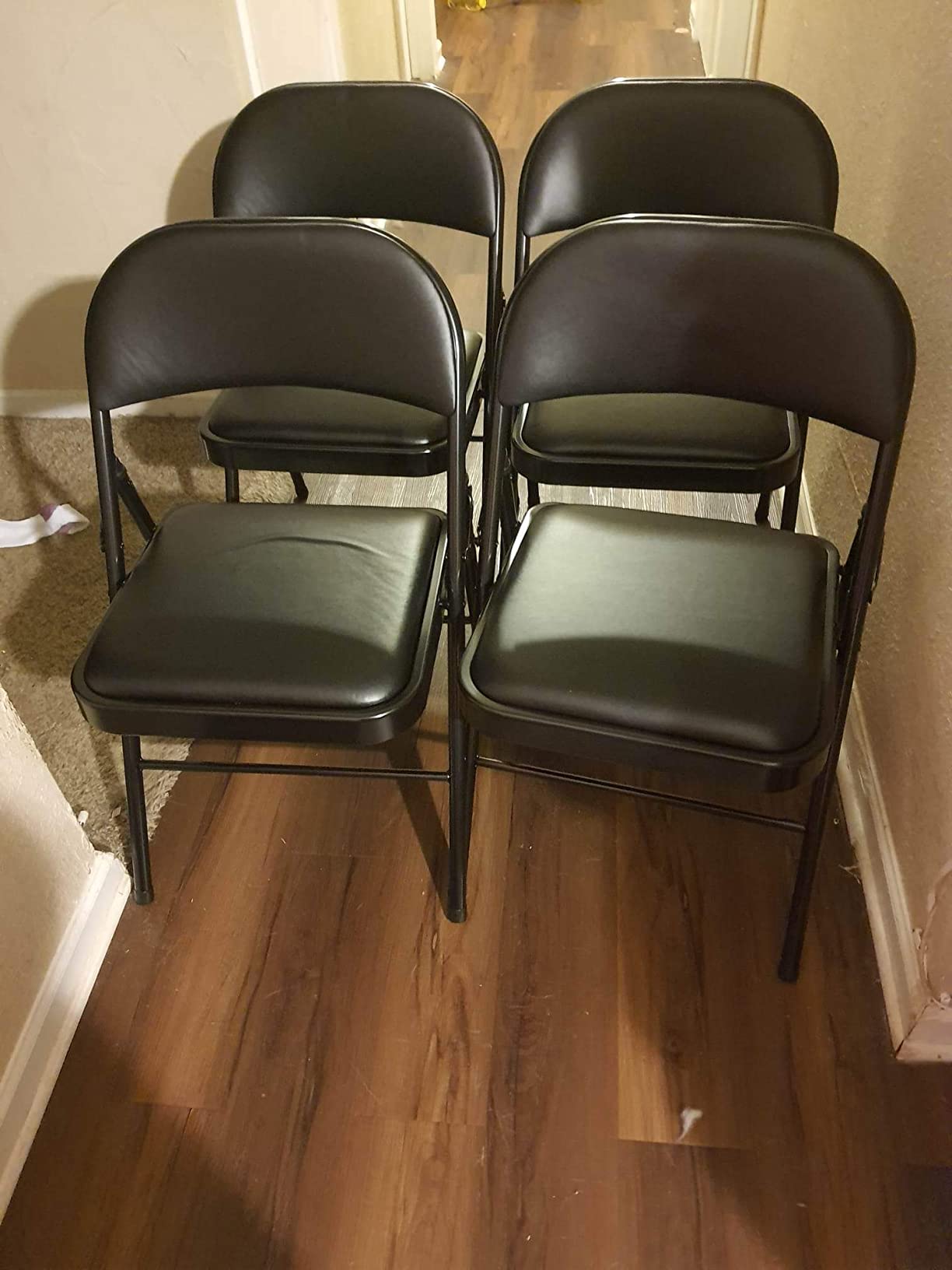 Amazon Basics Comfortable Vinyl-Padded Metal Steel Folding Chairs for Events, Easy to Fold and Store, Black, 4-Pack customer photo 1