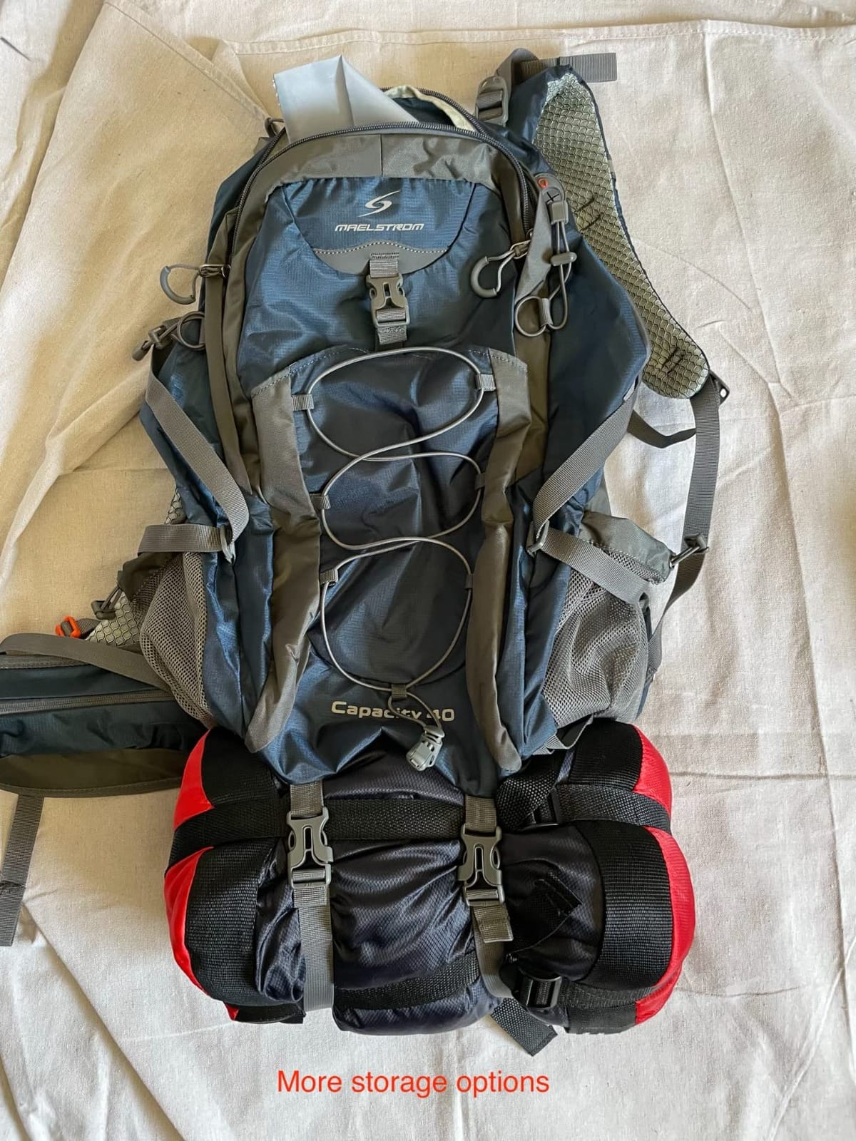 Maelstrom 40L Hiking Backpack, Lightweight Camping Daypack with Rain Cover | Water-Resistant Rip-Stop Nylon, Wet/Dry Separation, Multi-Pockets, Survival Whistle. Ideal For Men, Women, Travel, Trekking customer photo 2