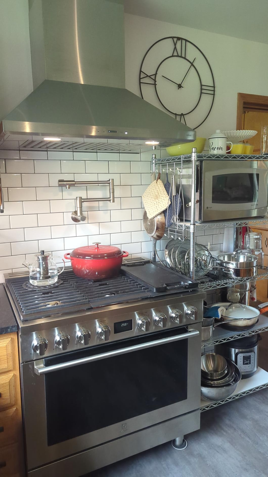 KRAUS Matte Black 21.5 in 2 Handle Wall Mount Pot Filler KPF-5003MB | Dual-joint swing arm extends 23 5/8 in, 4 gpm flow rate, 2-handle design prevents spills, cold water only connection customer photo 1
