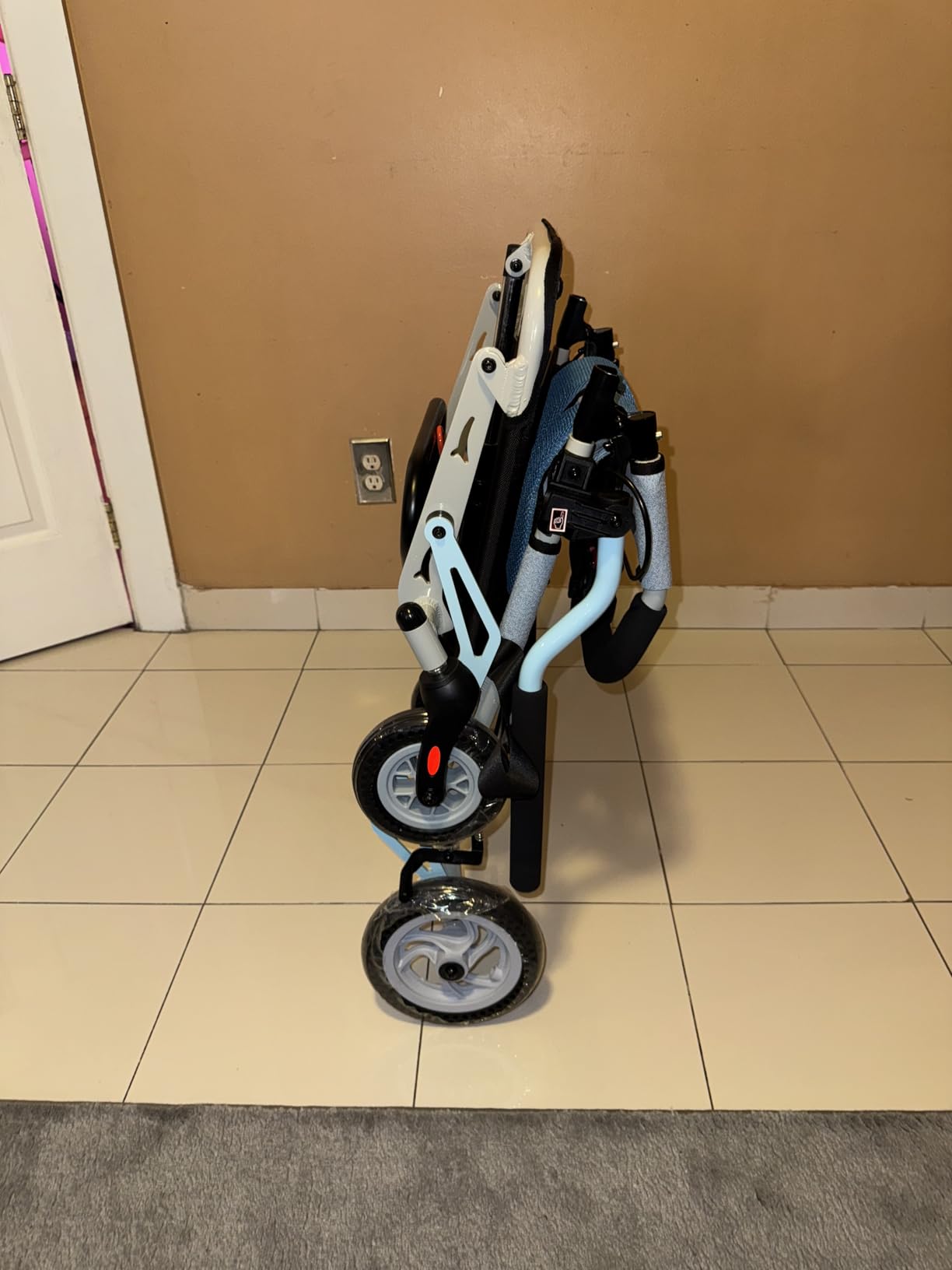 Super Lightweight Portable Transit Travel Wheelchair, Upgraded Folding Transport Wheelchairs (Weight 24lbs) for Adults and Seniors, Come with Telescopic Handle and Travel Bag customer photo 1