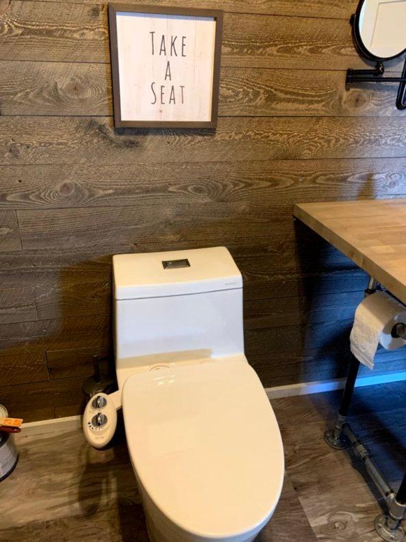WOODBRIDGE One Piece Toilet with Soft Closing Seat, Chair Height, 1.28 GPF Dual, Water Sensed, 1000 Gram MaP Flushing Score Toilet with Chrome Button, White customer photo 2