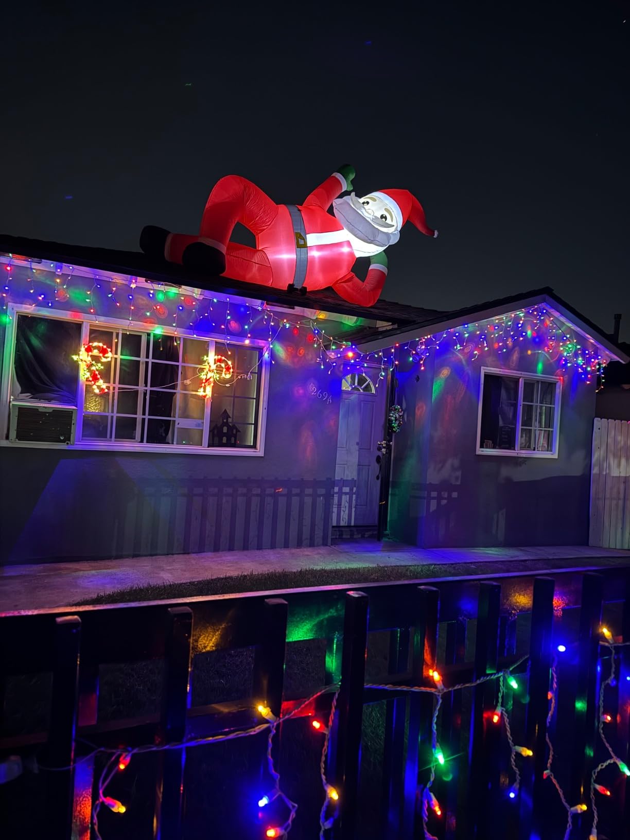 Juegoal Christmas Inflatables Outdoor Decorations, 12FT Long Inflatable Xmas Santa Claus, Lighted Blow Up Giant Lying Santa with Built in LED Lights, Light Up Holiday Winter Lawn Yard Garden Decor customer photo 2
