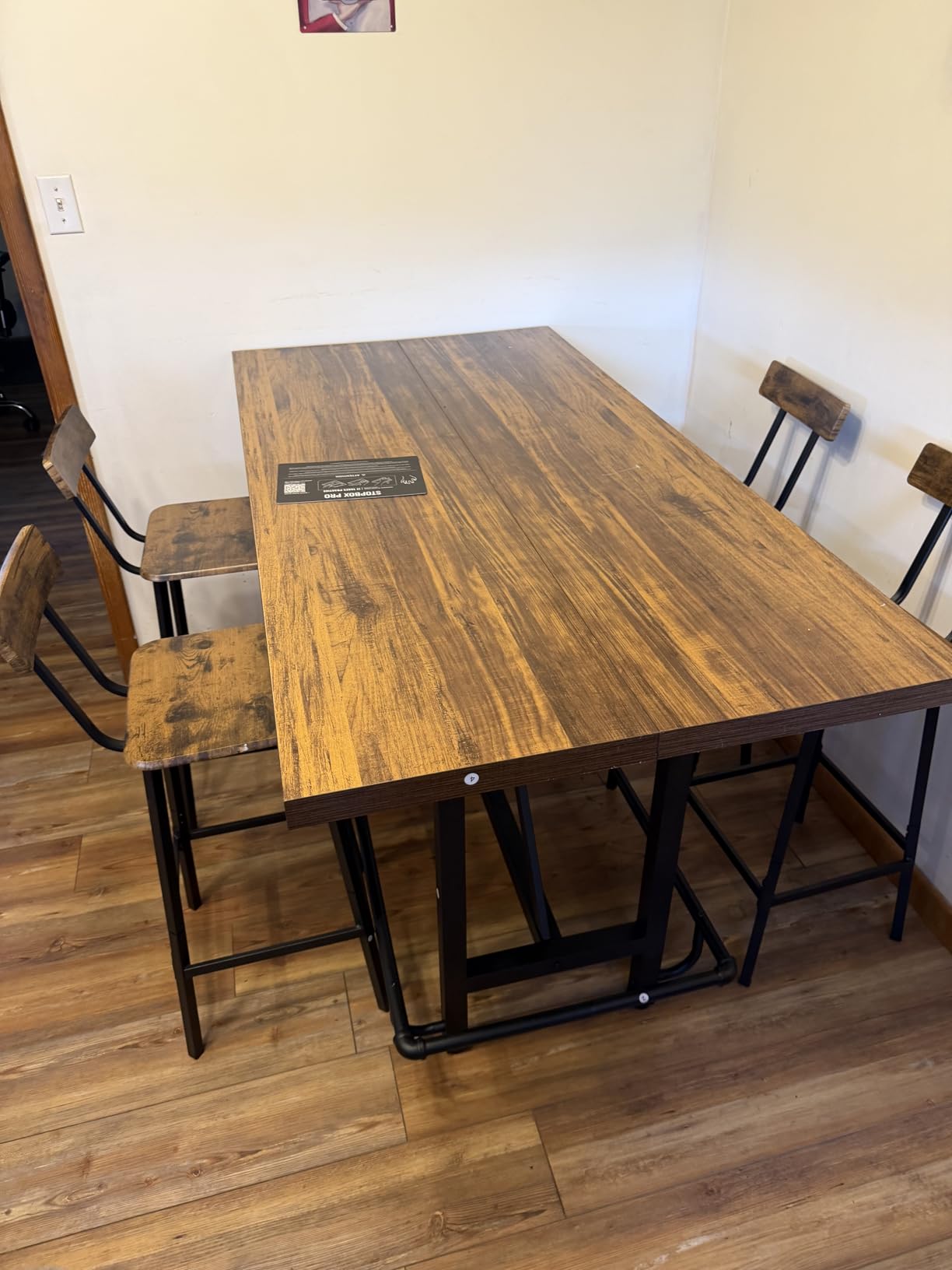 Tribesigns 63-Inch Counter Height Bar Table with Metal Footrest (Brown) | Industrial Rectangle Pub Table, Wood Kitchen Dining Table with Sturdy Metal Frame for Dining Room, Home Bar customer photo 1