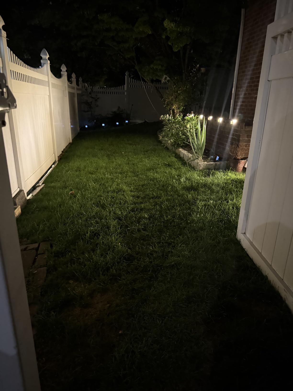 GKGG Solar Lights Outdoor Waterproof IP65, Solar Powered 76 LED 3 Lighting Modes Solar Spot Lights Outdoor for Yard Garden Landscape Pathway (Warm White, 4 Pack) customer photo 2