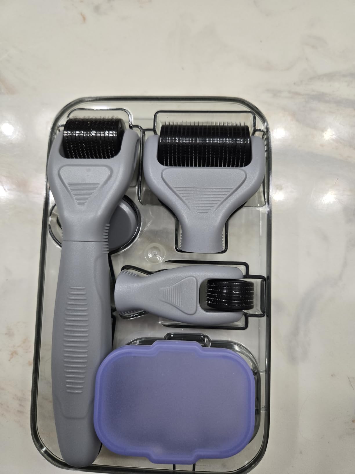 6-in-1 Microneedling Derma Roller Kit Face & Body (0.25 & 0.3mm) | Ultra-sharp titanium heads for scalp & beard care. Includes 300, 720 & 1200 needles with built-in disinfection basin. customer photo 1