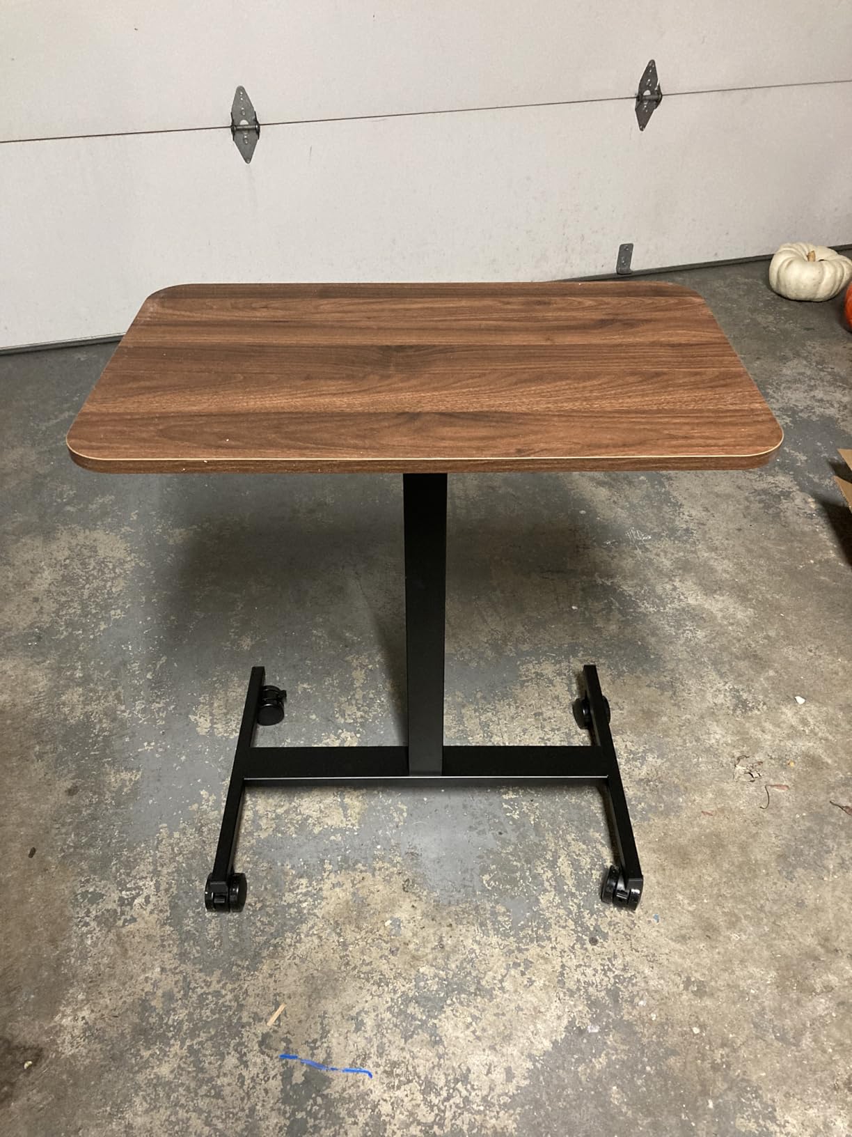 HUANUO Small Rolling Laptop Standing Desk, Height Adjustable Mobile T-Base Desk with Lockable Casters, Portable Sit-Stand Workstation for Bedside & Sofa, Walnut customer photo 1