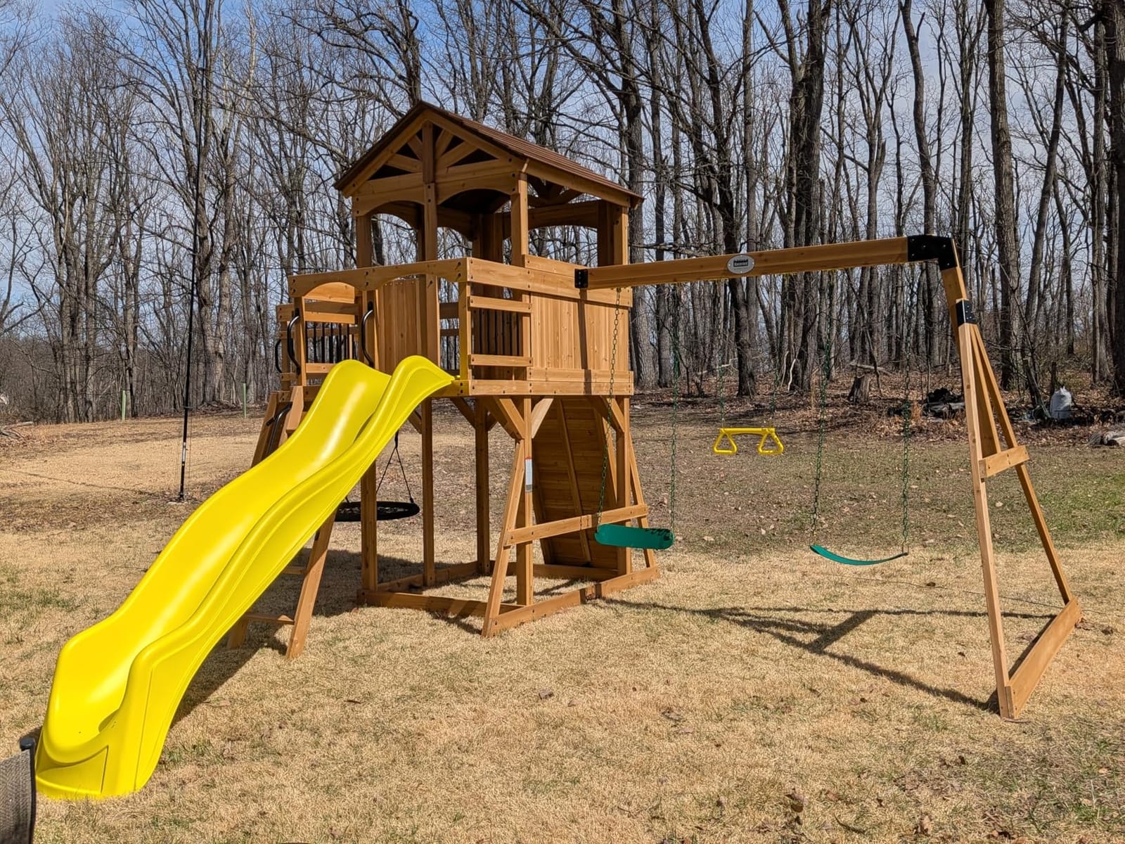 Backyard Discovery Dover Bay Spruce Wood Swing Set with Wave Slide, Clubhouse, Monkey Bars, Rock Wall, Belt Swings, Step Ladder, Toy Telescope, Chalkboard, Outdoor Playset customer photo 1
