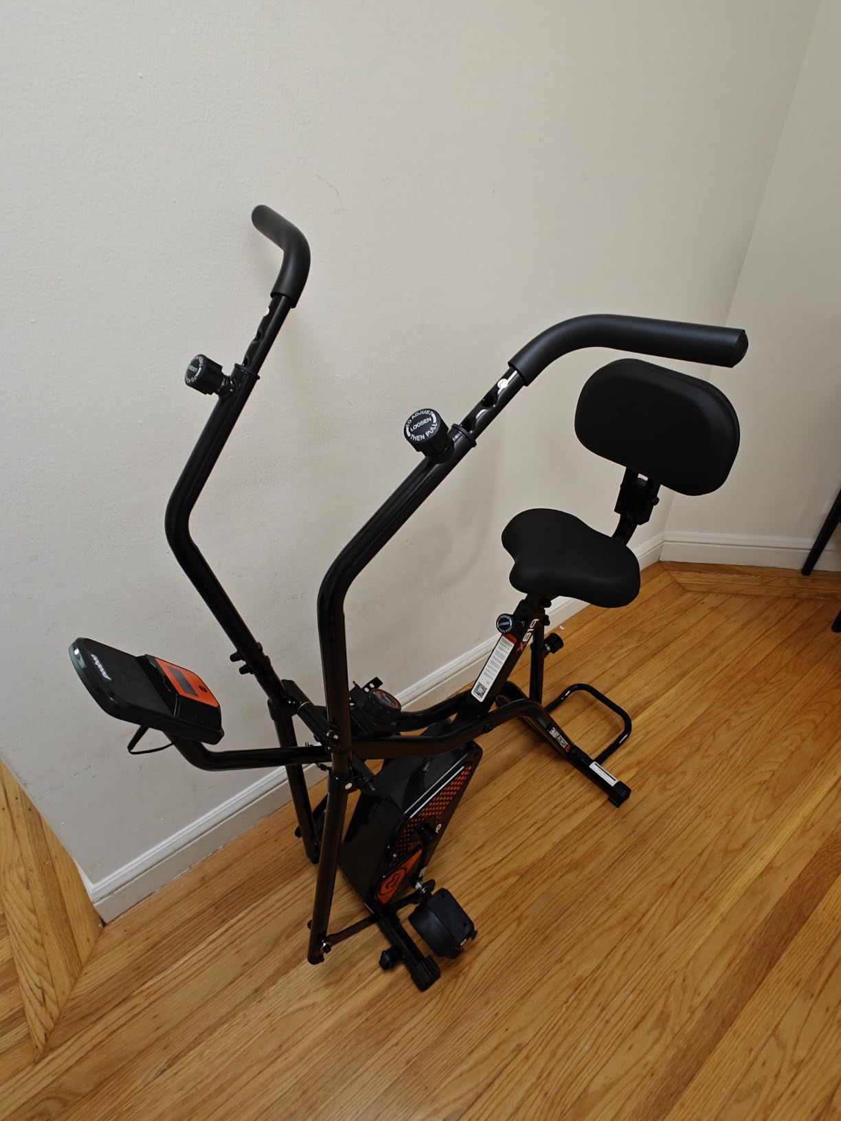 pooboo Folding Magnetic X-Bike, Upright Exercise Bike for Home Gym | Foldable Indoor Stationary Cycling Bike, 8-Level Resistance, 6.6 LBS Flywheel, 300 LB Capacity, Back Support Cushion customer photo 2