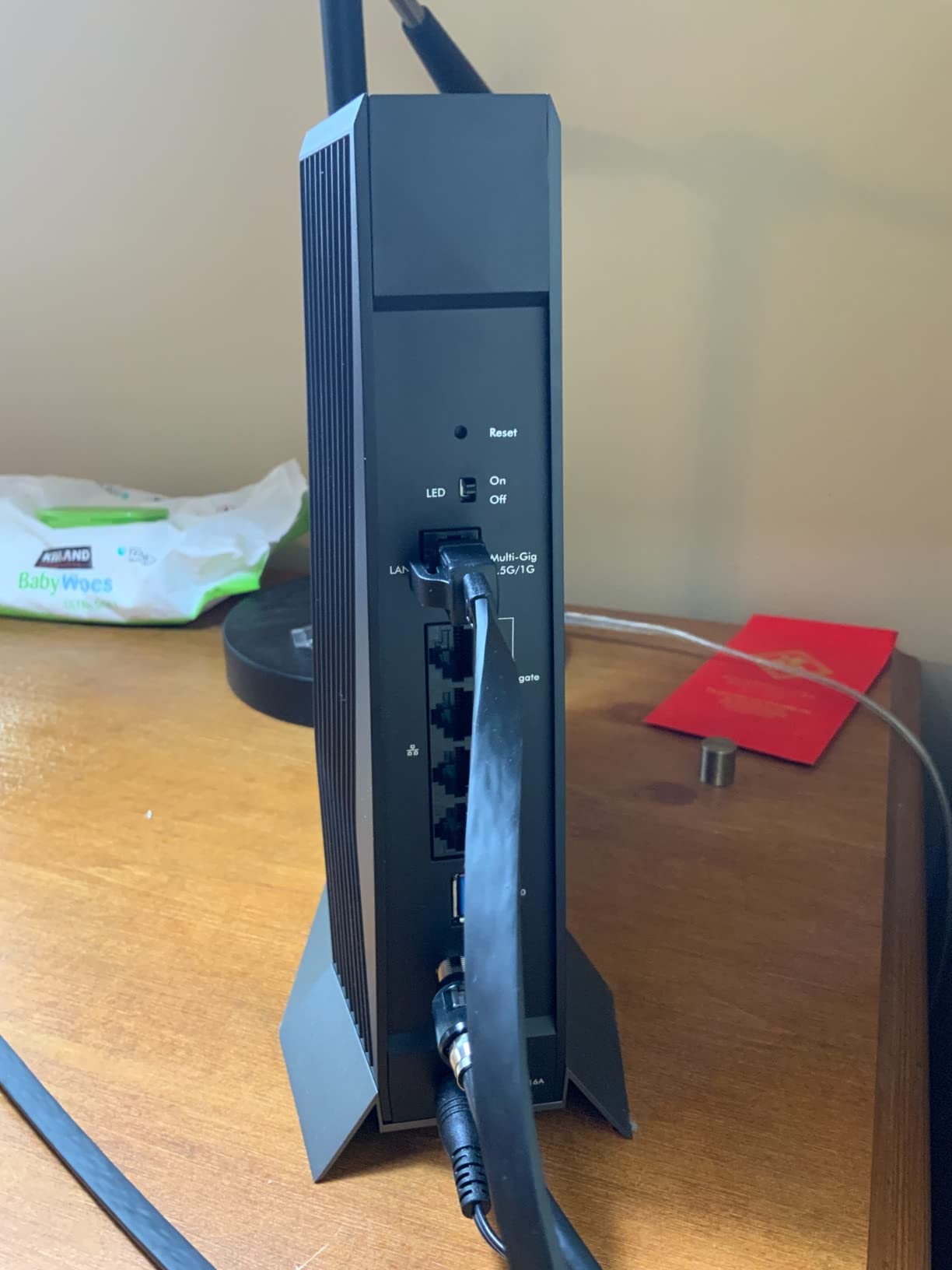 NETGEAR Nighthawk Cable Modem and WiFi 6 Router Combo (CAX80) - Compatible with All Major Cable Providers incl. Xfinity, Spectrum, Cox - Cable Plans up to 2 Gbps - AX6000 WiFi 6 Speed - DOCSIS 3.1 customer photo 1