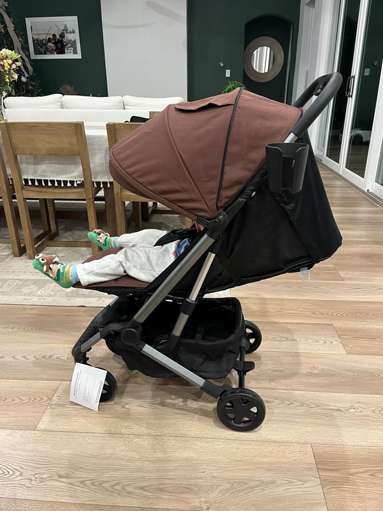 Colugo Compact+ Lightweight Travel Stroller, 16 lbs, One-Hand Fold | For Infants and Toddlers 6mo-4yrs, One-hand Auto-fold, 5-Point Harness, Carry Bag, Rain Cover & Cup Holder Included, Black customer photo 1