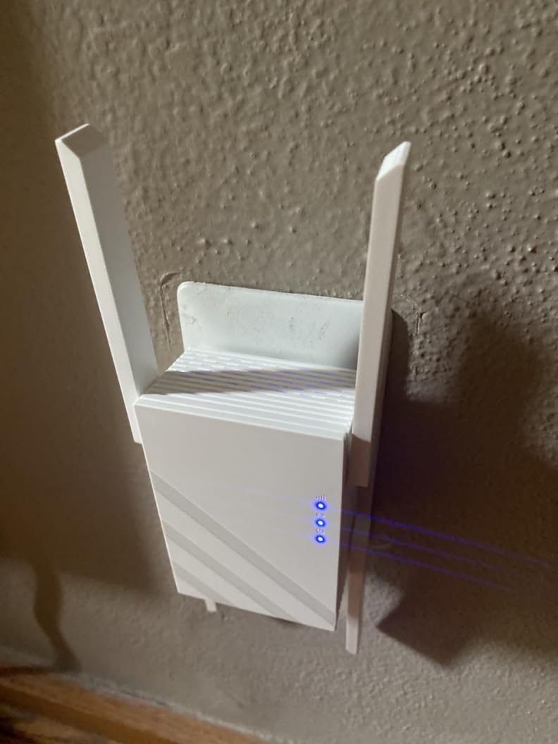 2026 1.2Gbps WiFi Extender Signal Booster, Up to 12880 Sq. Ft, Dual Band(5GHz/2.4GHz), Easy Setup WiFi Range Extender for Home with Ethernet Port, Stable Speed Repeater with 100+ Devices (White) customer photo 1